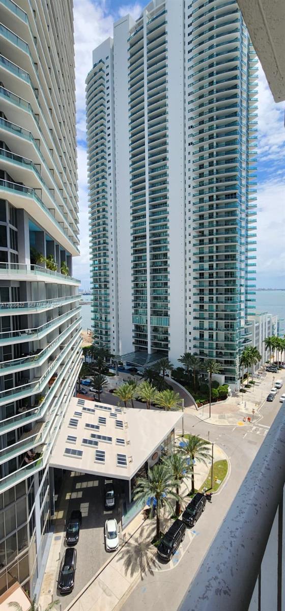 170 Southeast 14th Street, Unit 1408 Miami, FL 33131 - Photo 20 of 30 a view of house with backyard and sitting area