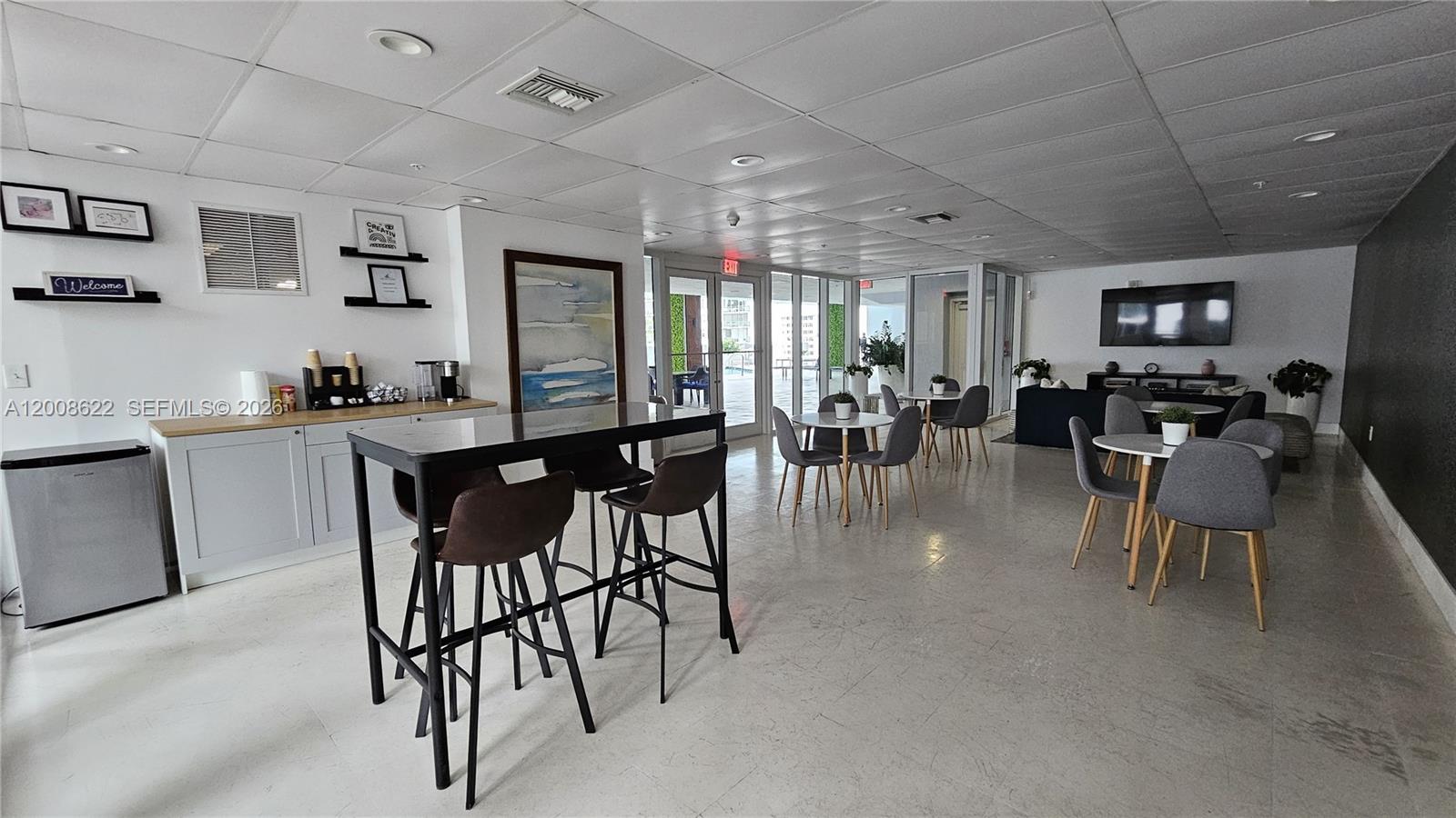 170 Southeast 14th Street, Unit 1408 Miami, FL 33131 - Photo 23 of 30 a view of a dining area with furniture