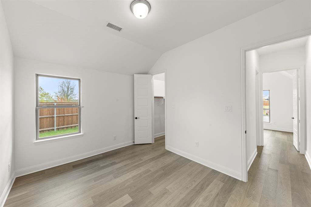 801 Stoney Bridge Way Lavon, TX 75166 - Photo 16 of 38 The Huntley B Primary Suite Bedroom