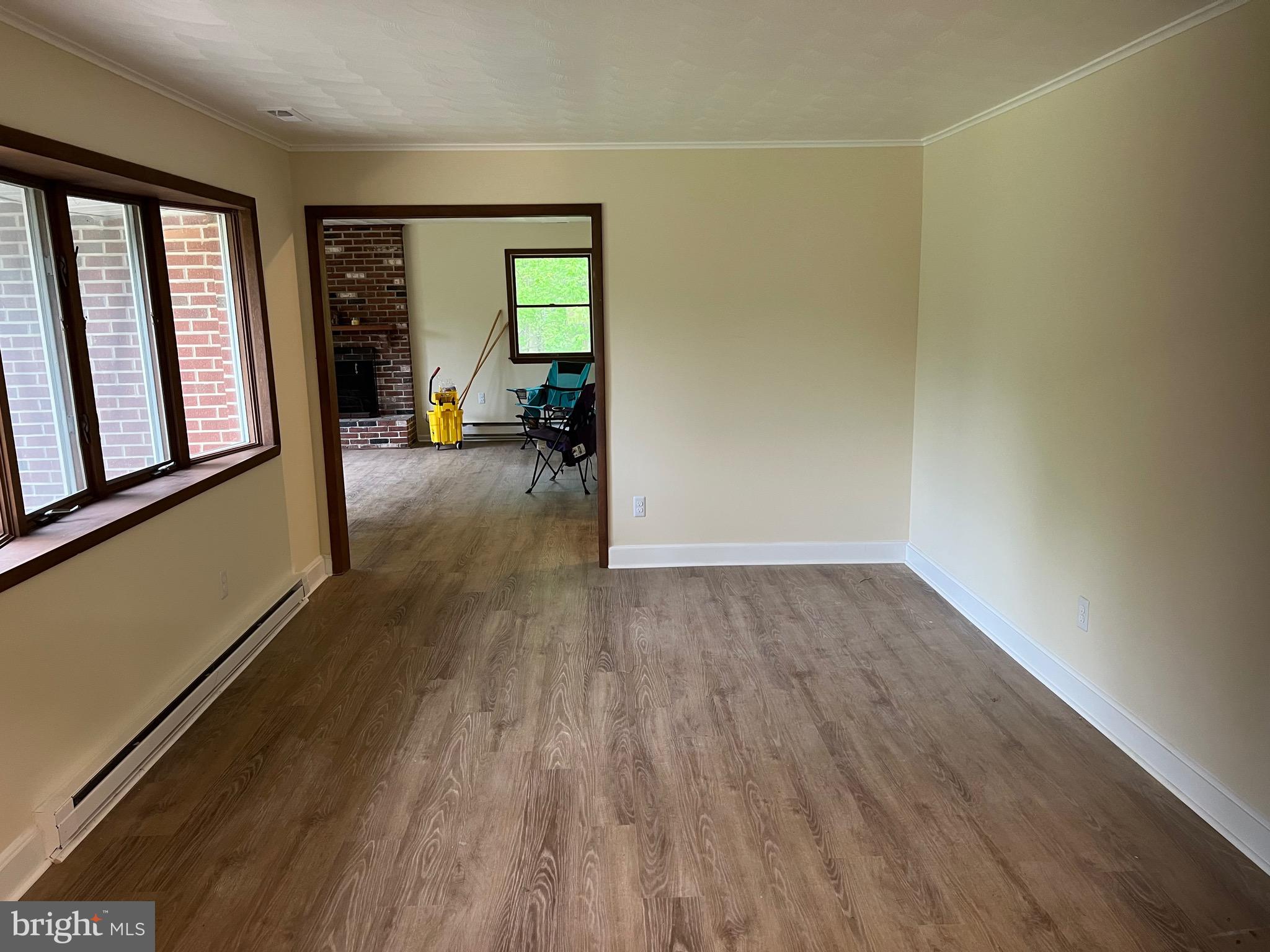2617 Franklinville Road Joppa, MD 21085 - Photo 12 of 39 an empty room with wooden floor and windows