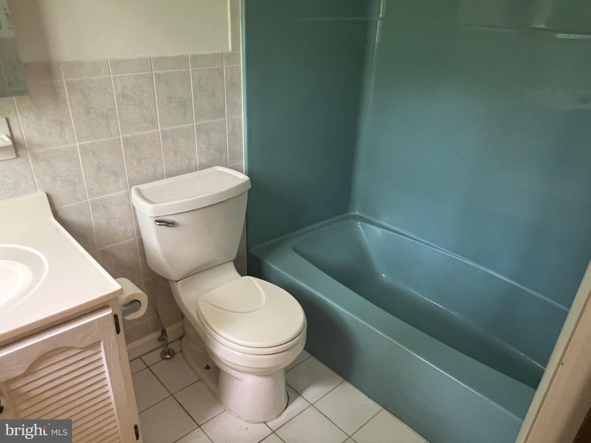 2617 Franklinville Road Joppa, MD 21085 - Photo 18 of 39 a white toilet sitting next to a bathroom sink
