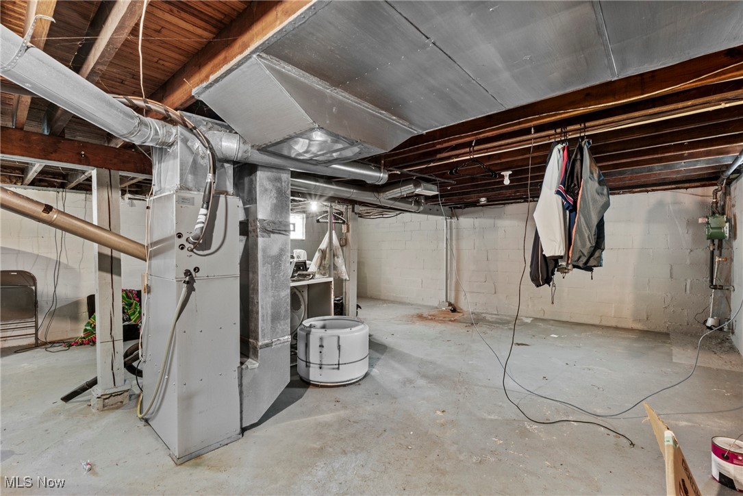 640 Plainfield Road Akron, OH 44312 - Photo 18 of 25 Unfinished below grade area featuring heating unit