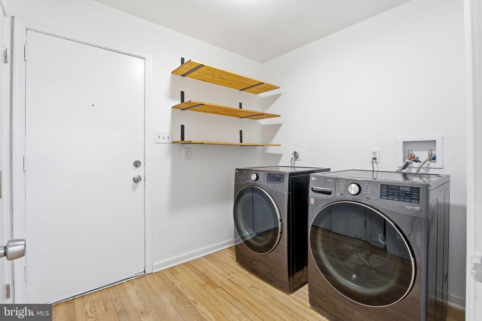15101 Redgate Drive Silver Spring, MD 20905 - Photo 20 of 39 a utility room with dryer and washer