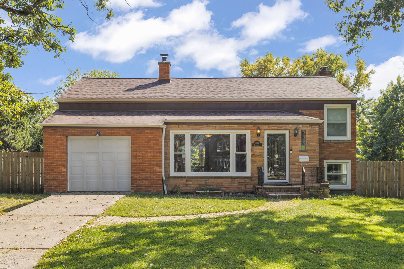 8119 Edgewater Road North Riverside, IL 60546 - Photo 1 of 26 front view of a house with a yard