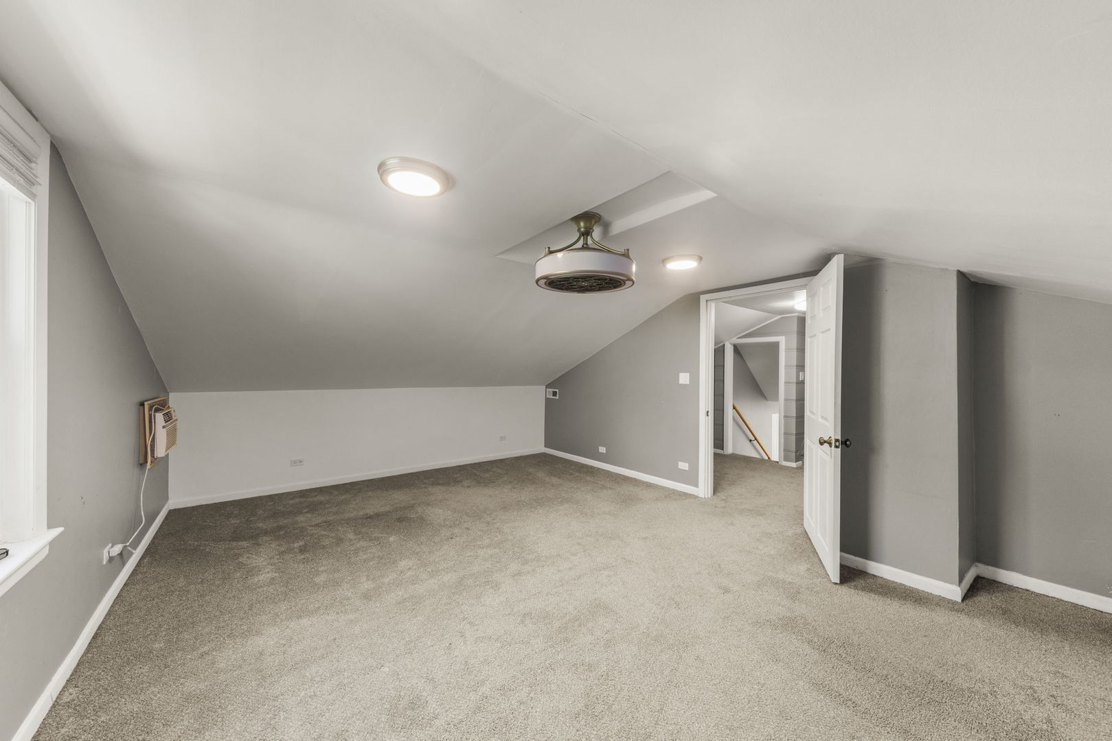 8119 Edgewater Road North Riverside, IL 60546 - Photo 15 of 26 an empty room with chandelier fan