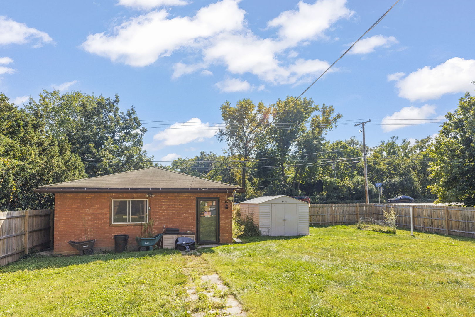 8119 Edgewater Road North Riverside, IL 60546 - Photo 20 of 26 a view of a house with yard and a large tree
