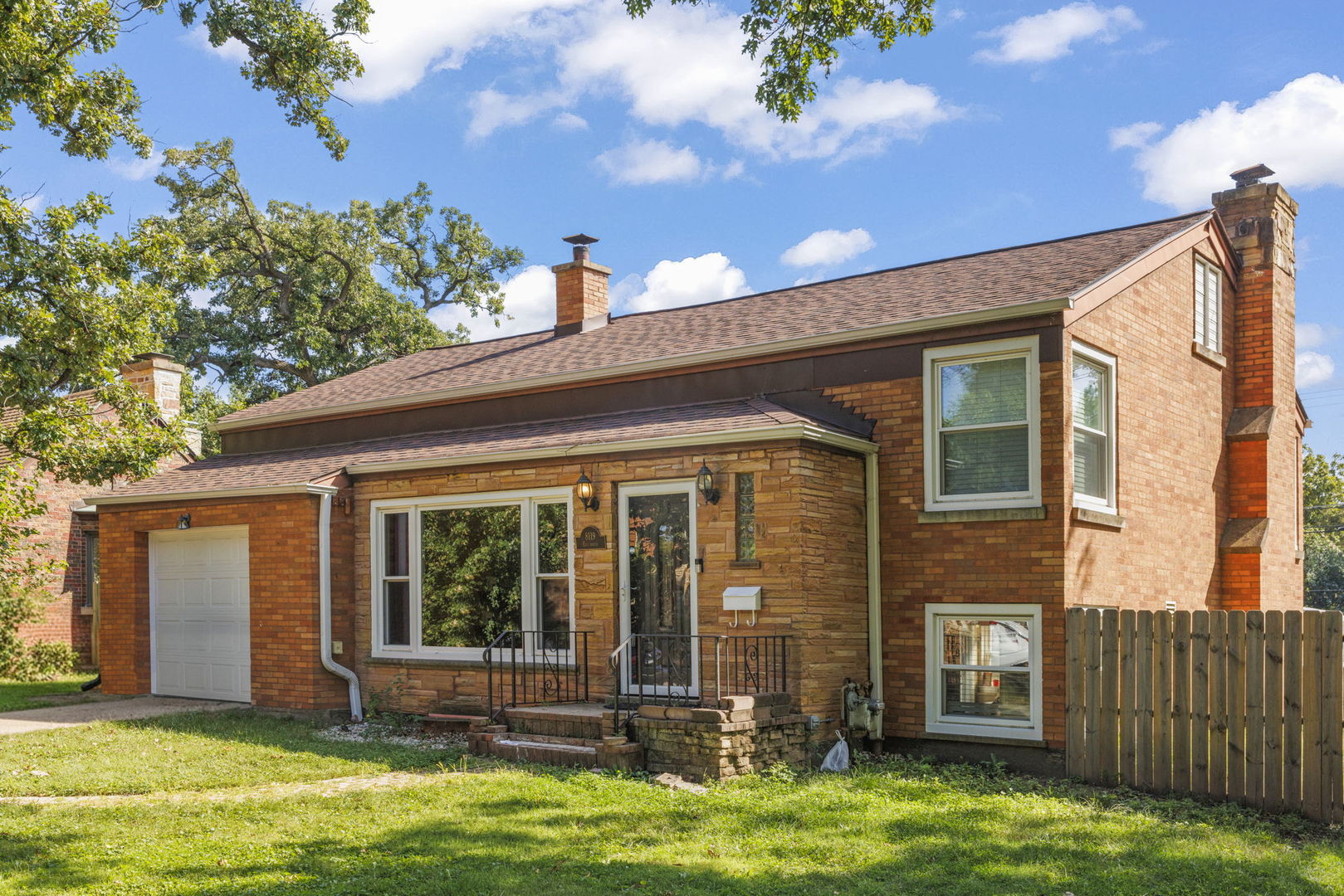 8119 Edgewater Road North Riverside, IL 60546 - Photo 2 of 26 a front view of a house with a yard