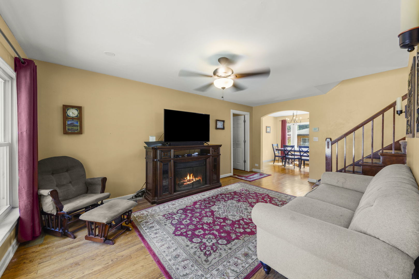 8119 Edgewater Road North Riverside, IL 60546 - Photo 3 of 26 a living room with furniture and a flat screen tv