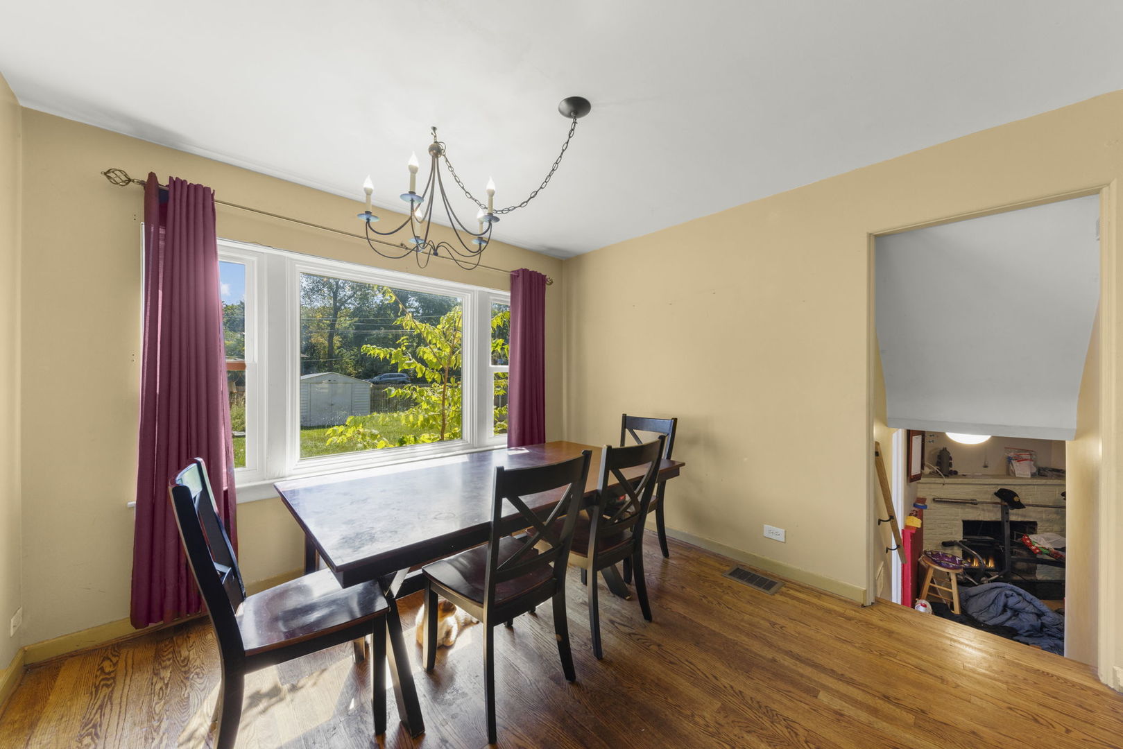 8119 Edgewater Road North Riverside, IL 60546 - Photo 6 of 26 a view of a dining room with furniture window and wooden floor