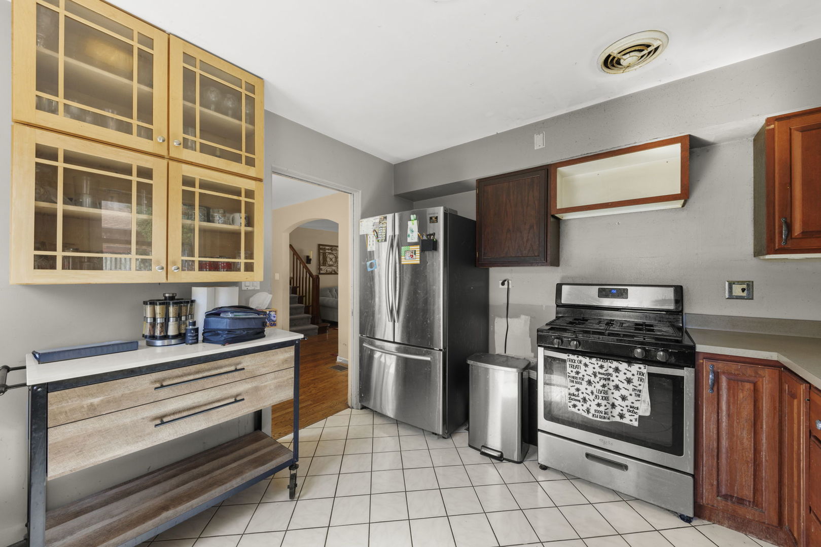 8119 Edgewater Road North Riverside, IL 60546 - Photo 7 of 26 a kitchen with granite countertop a stove a refrigerator and a sink