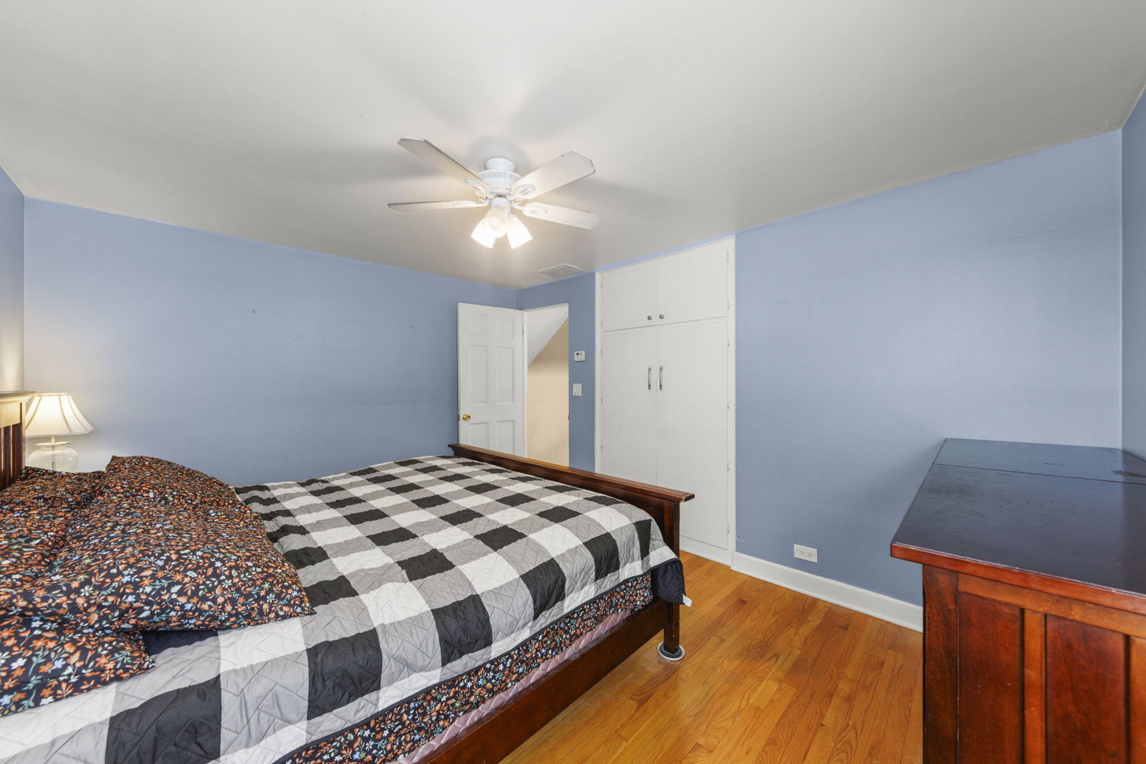 8119 Edgewater Road North Riverside, IL 60546 - Photo 10 of 26 a bedroom with a bed and dresser