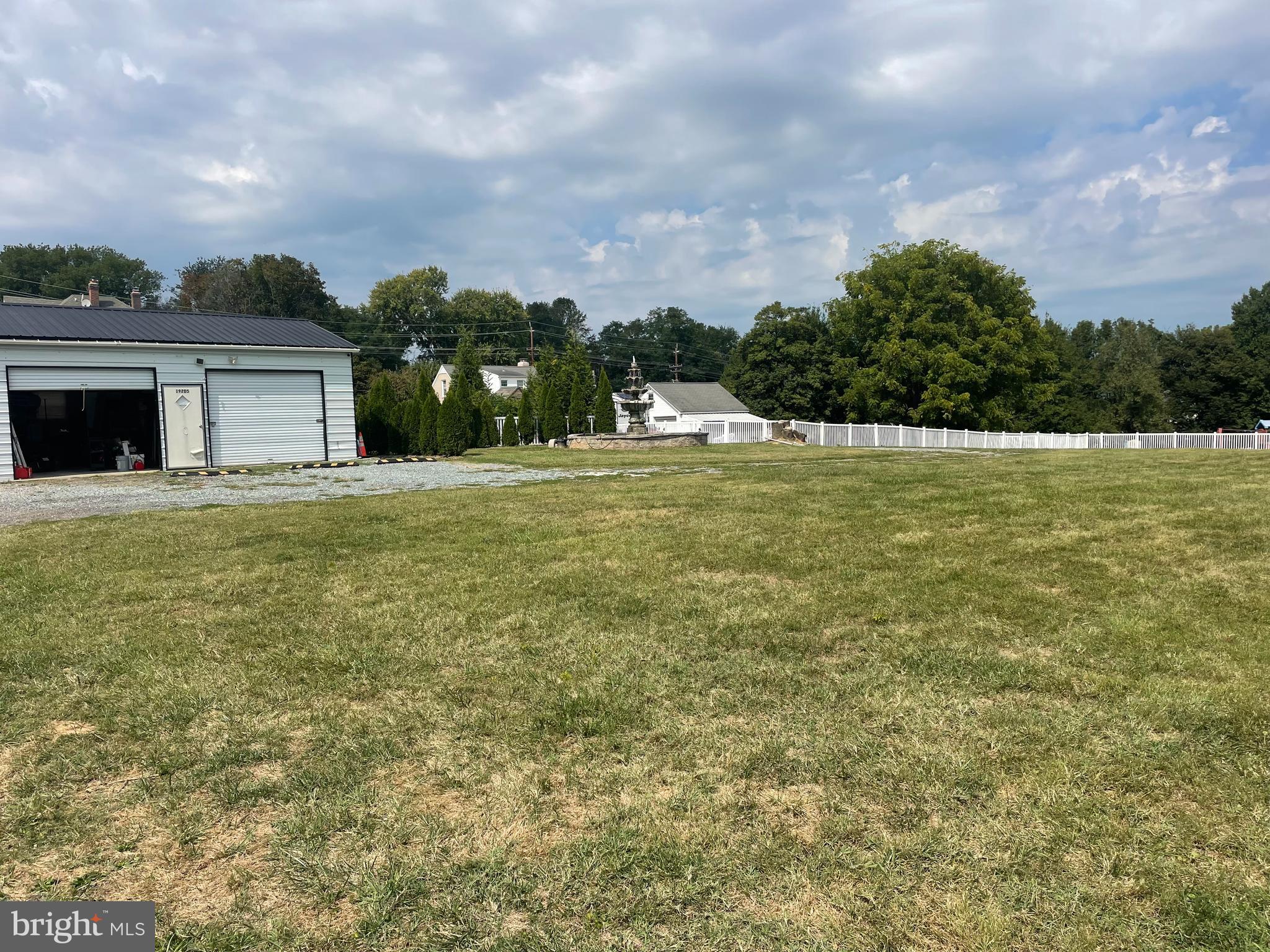 19205 Liberty Mill Road Germantown, MD 20874 - Photo 4 of 6 a big yard with lots of tress in it