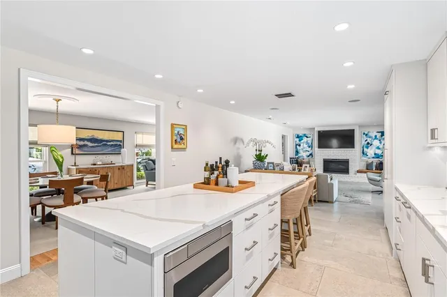 a view of a kitchen and dining room