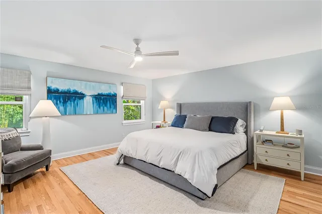 a bedroom with a bed and a couch