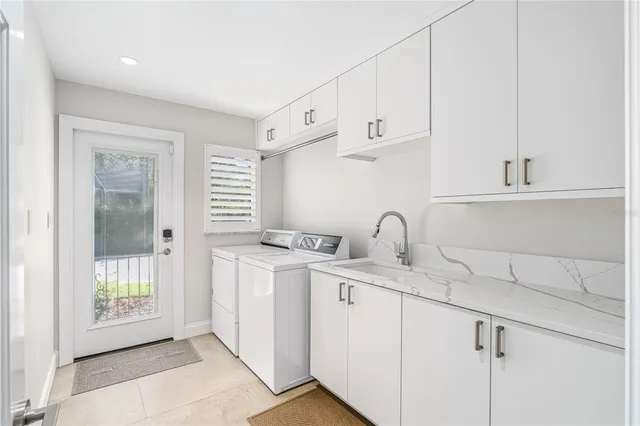 a view of a kitchen with cabinets