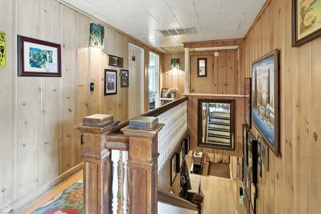 a bedroom with bed and a window