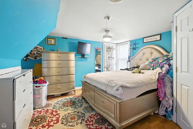 a view of backyard of house and garage