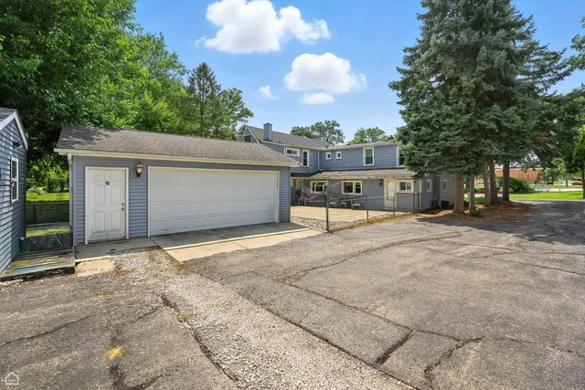a bathroom with a sink double vanity and a mirror