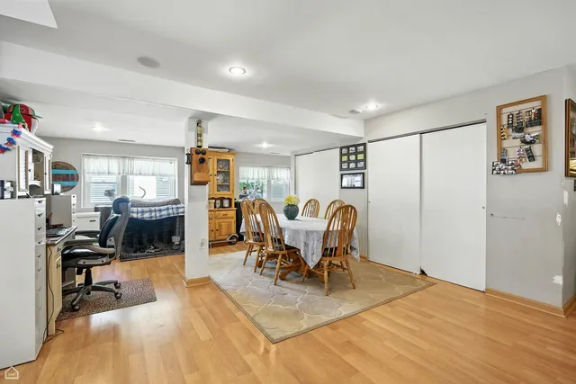 a view of entryway with stairs and wooden floor