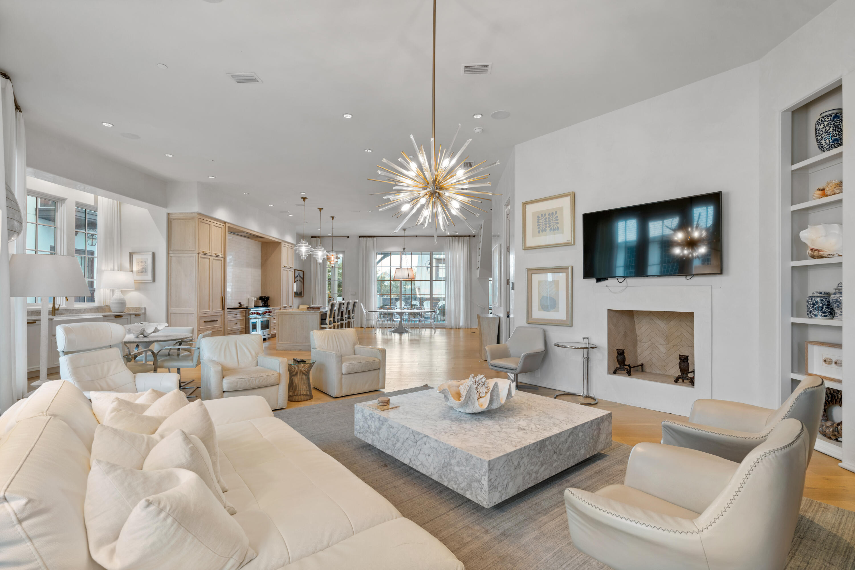 16 South Barrett Square, Unit 5 Rosemary Beach, FL 32461 - Photo 13 of 100 a living room with furniture a fireplace and a flat screen tv