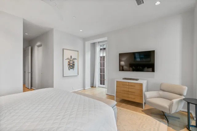 a bathroom with a granite countertop sink a mirror and a shower