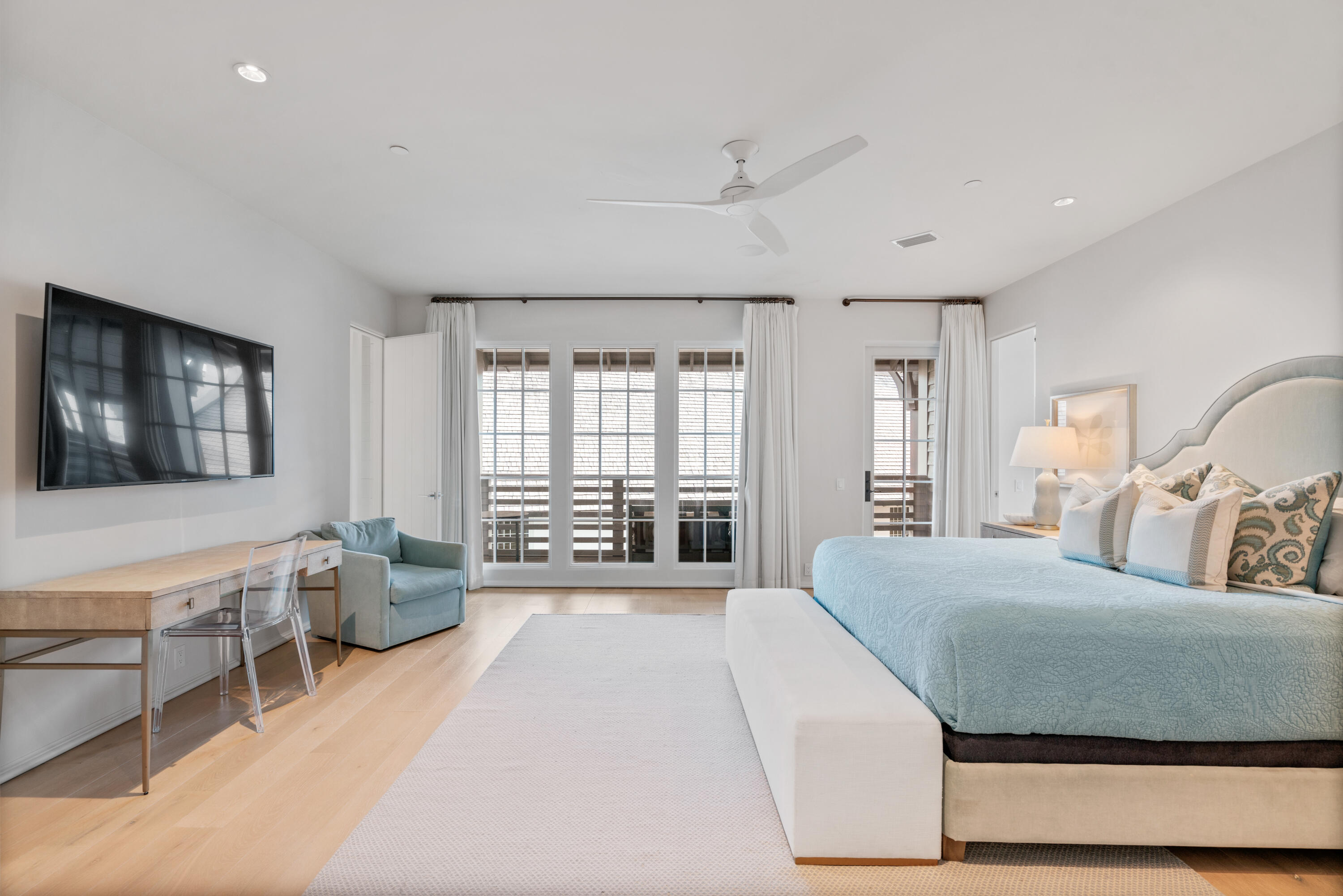 16 South Barrett Square, Unit 5 Rosemary Beach, FL 32461 - Photo 49 of 100 a bedroom with a large bed and a couch