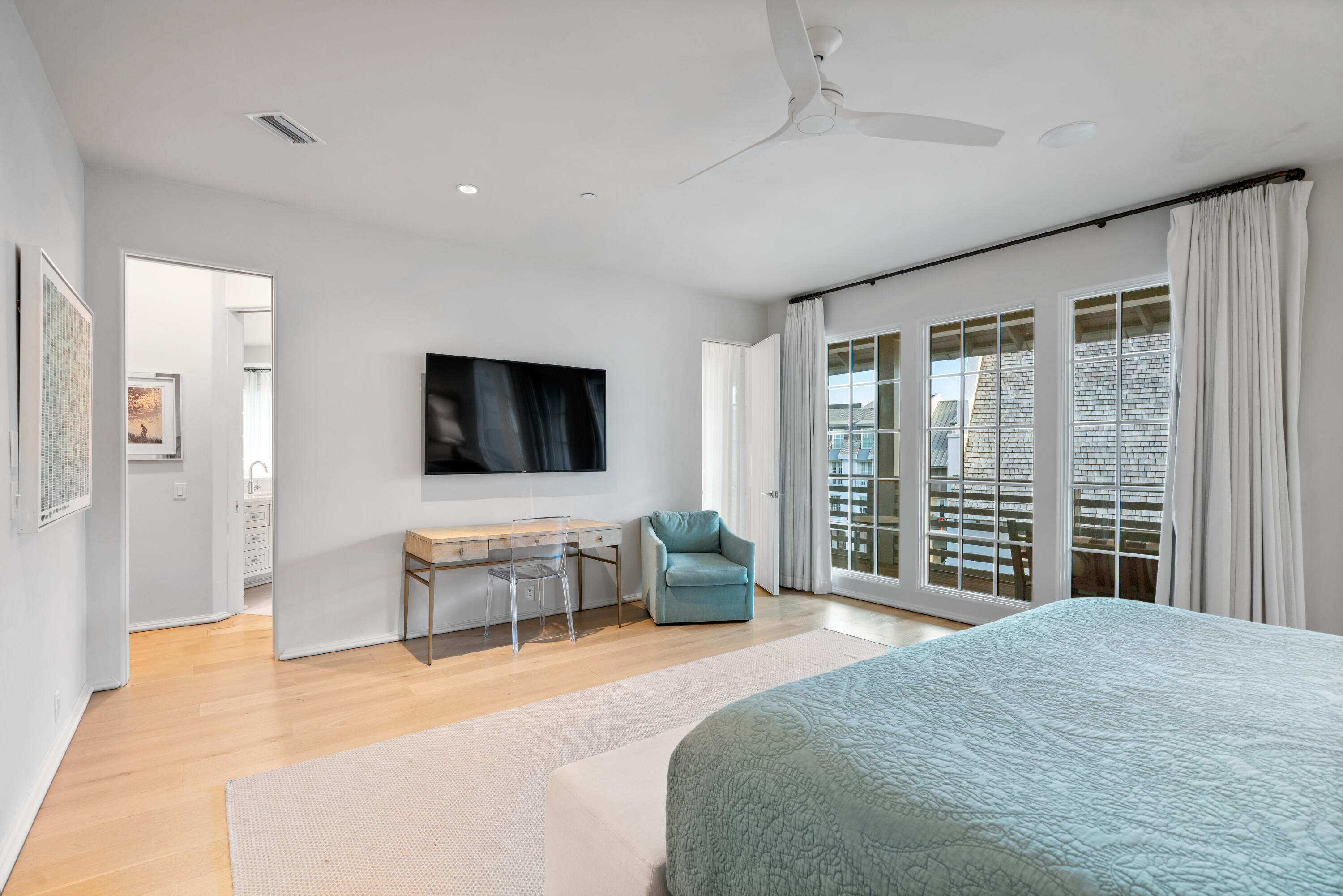 16 South Barrett Square, Unit 5 Rosemary Beach, FL 32461 - Photo 50 of 100 a bedroom with a bed and a flat screen tv