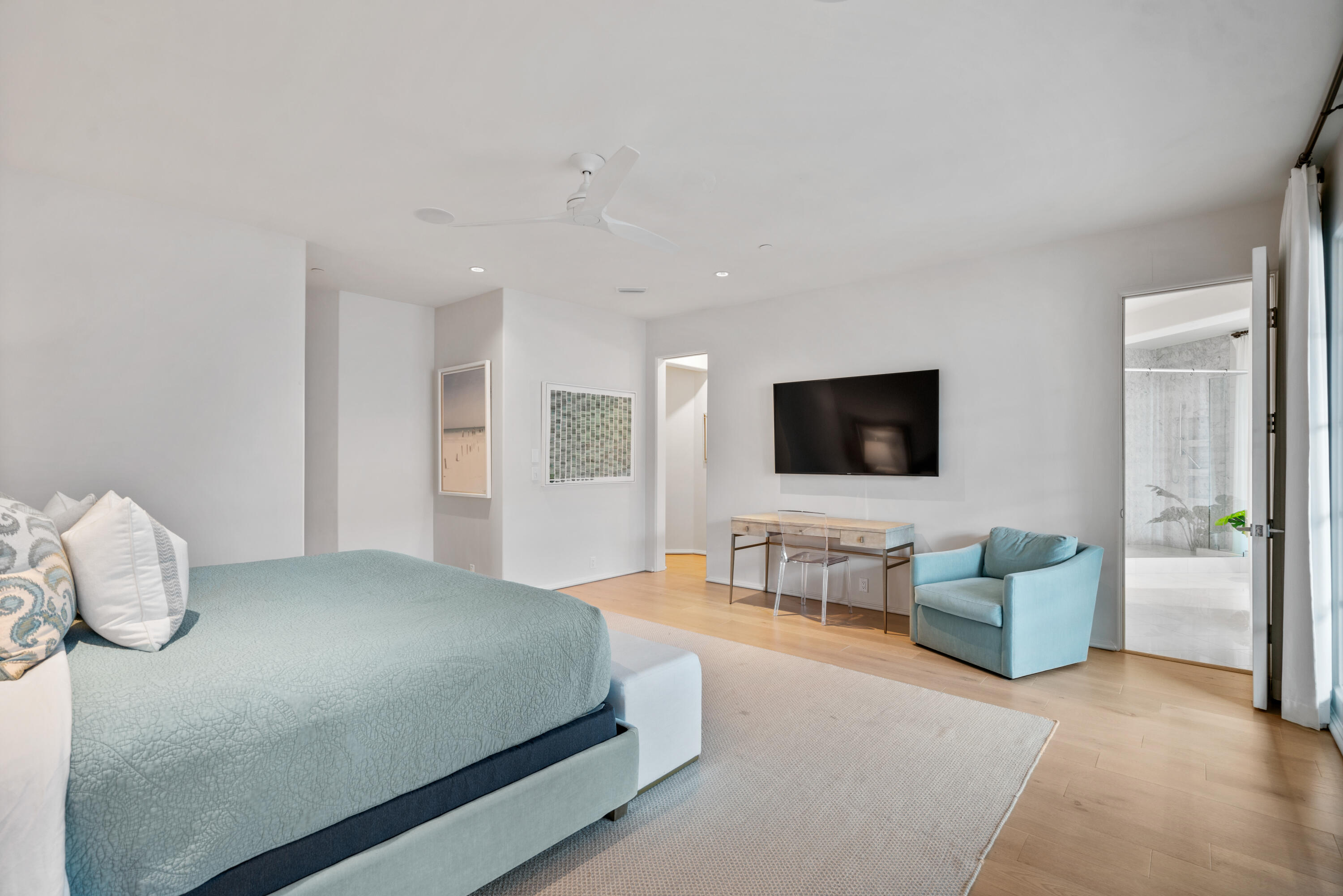 16 South Barrett Square, Unit 5 Rosemary Beach, FL 32461 - Photo 51 of 100 a bedroom with a bed and a flat screen tv