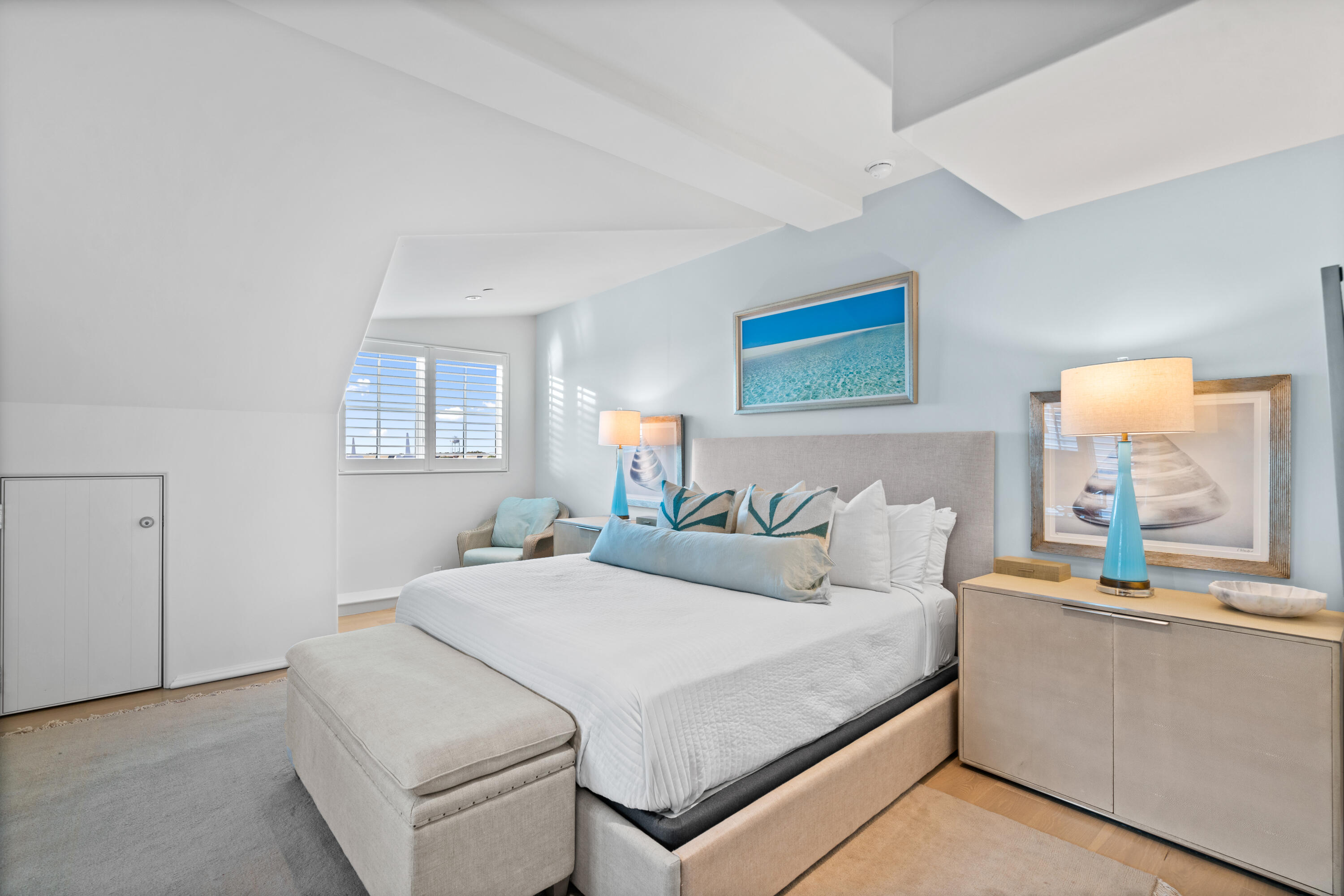 16 South Barrett Square, Unit 5 Rosemary Beach, FL 32461 - Photo 60 of 100 a bedroom with a bed and a large mirror