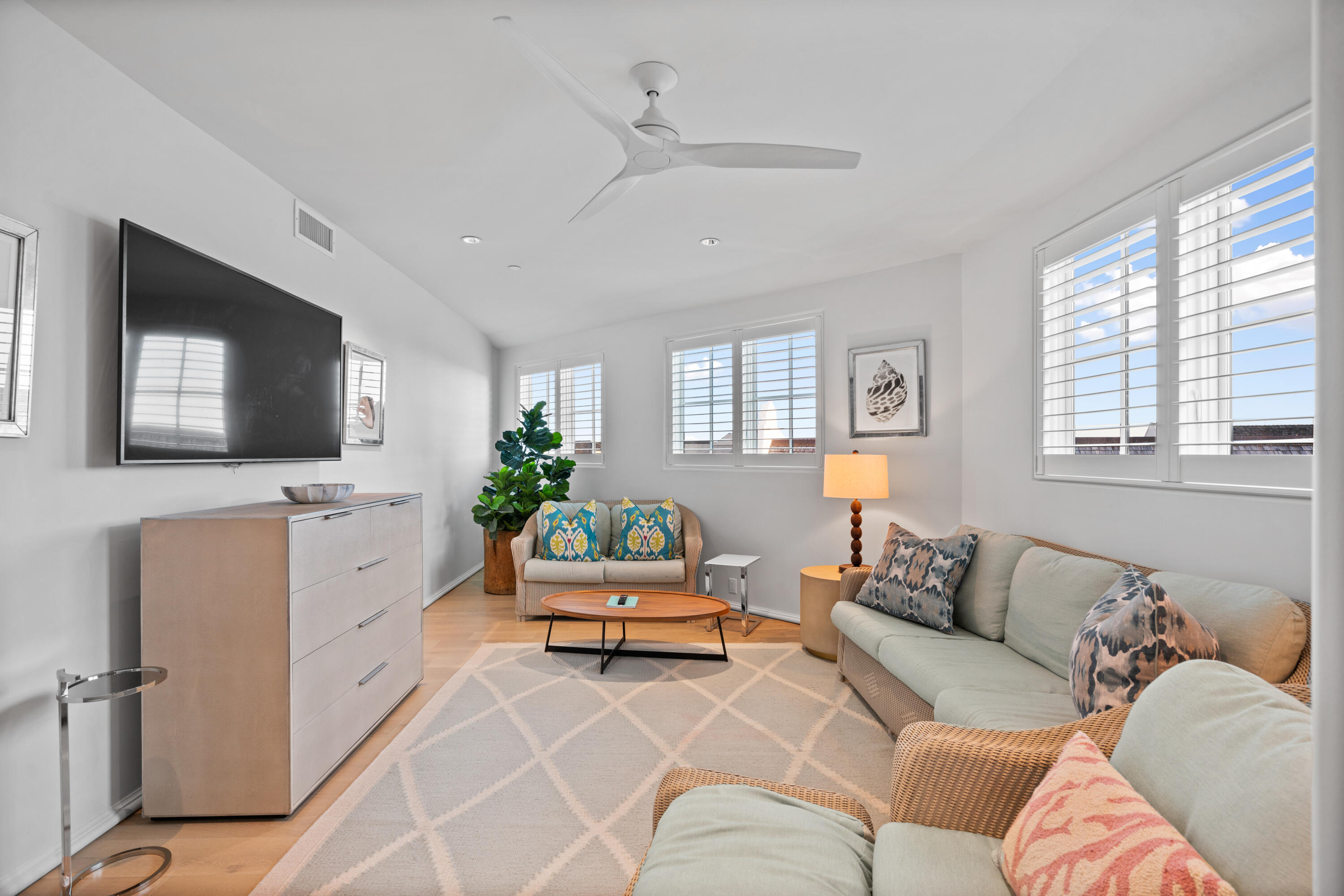 16 South Barrett Square, Unit 5 Rosemary Beach, FL 32461 - Photo 64 of 100 a living room with furniture and a flat screen tv