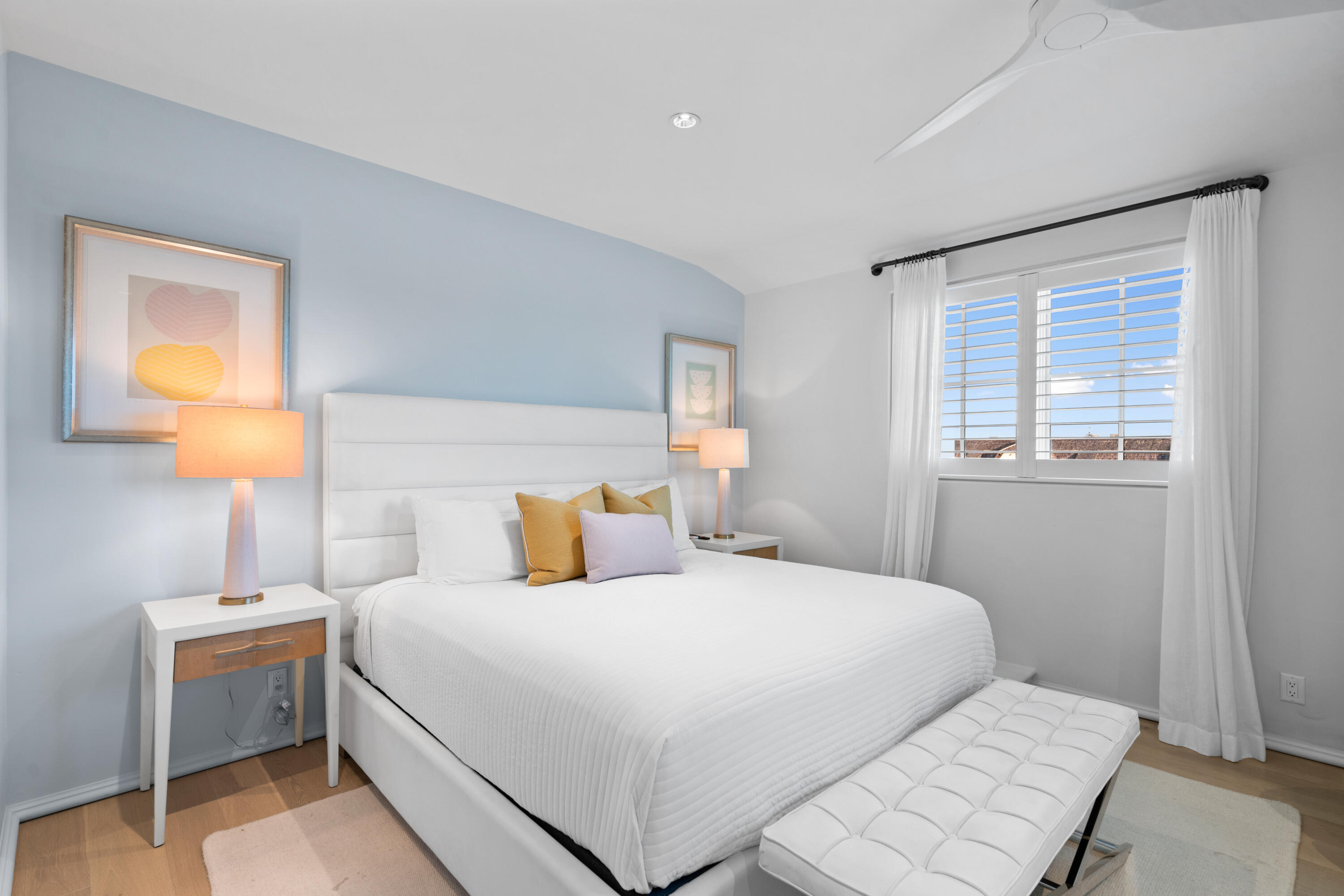 16 South Barrett Square, Unit 5 Rosemary Beach, FL 32461 - Photo 72 of 100 a bedroom with a bed and a lamp