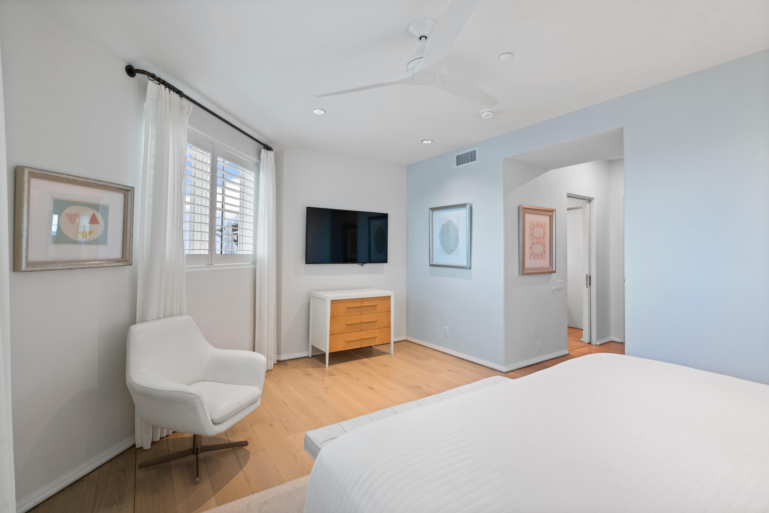 16 South Barrett Square, Unit 5 Rosemary Beach, FL 32461 - Photo 74 of 100 a bedroom with a bed and a flat screen tv