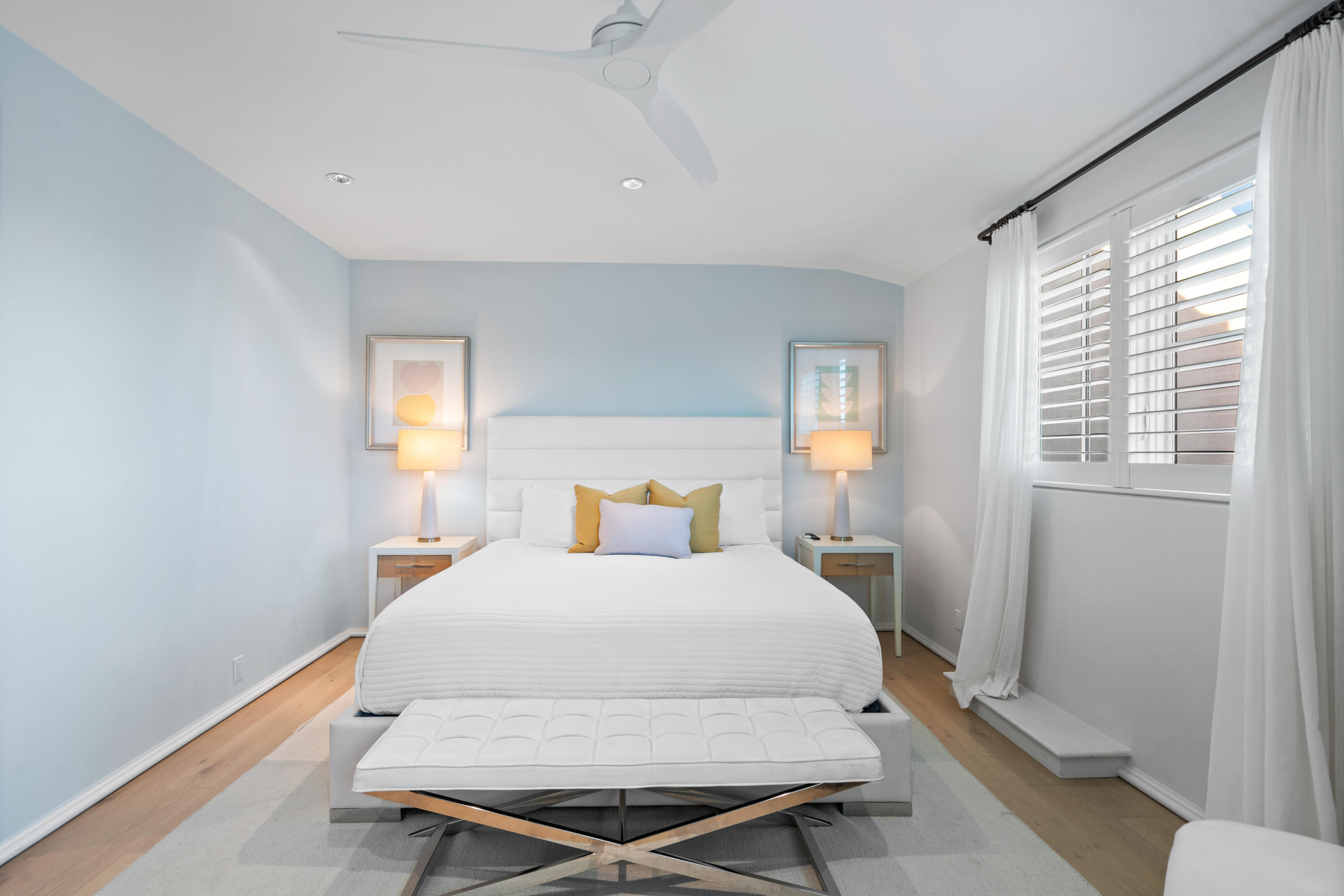 16 South Barrett Square, Unit 5 Rosemary Beach, FL 32461 - Photo 75 of 100 a bedroom with a bed and wooden floor