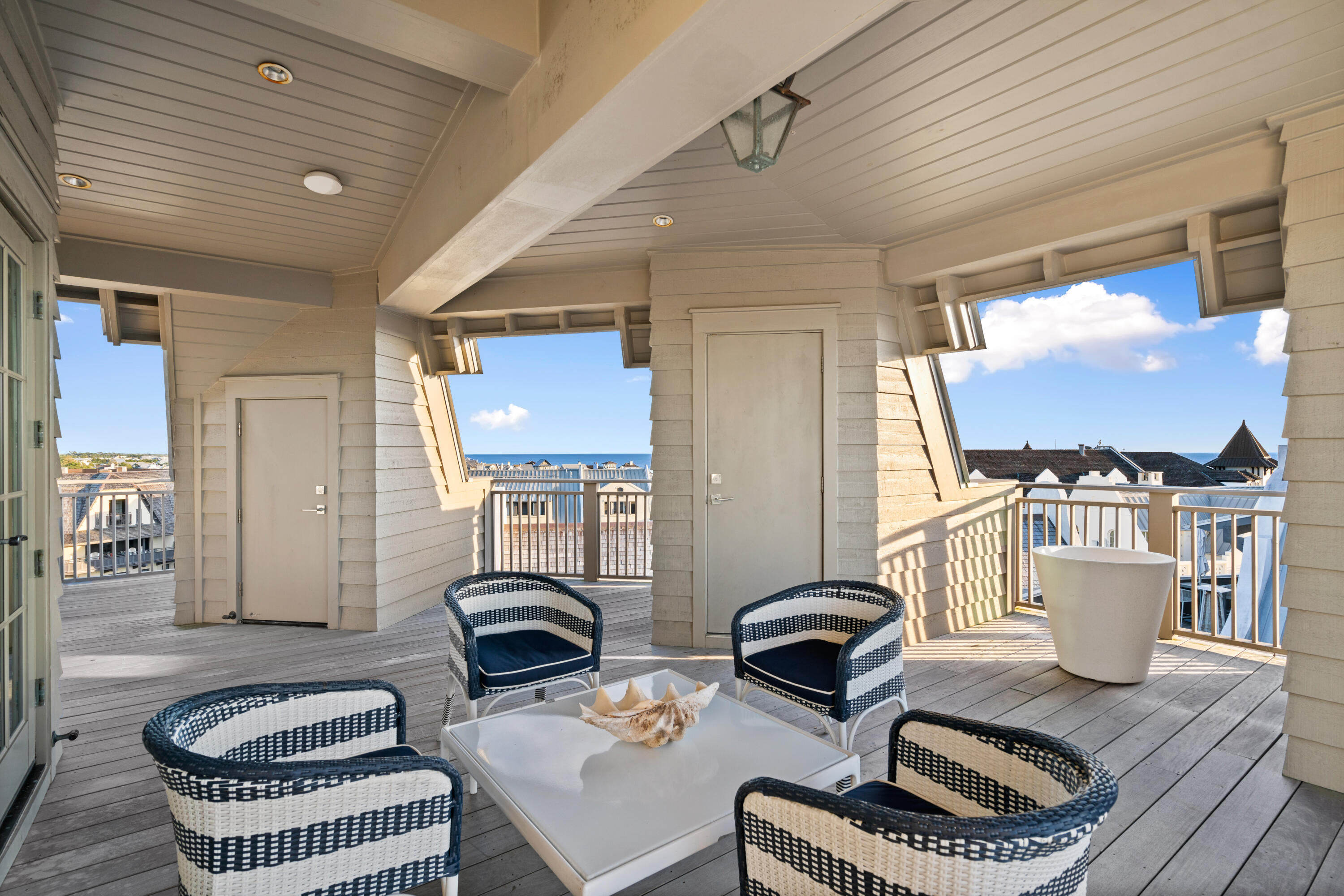 16 South Barrett Square, Unit 5 Rosemary Beach, FL 32461 - Photo 79 of 100 a living room with furniture a rug and a window
