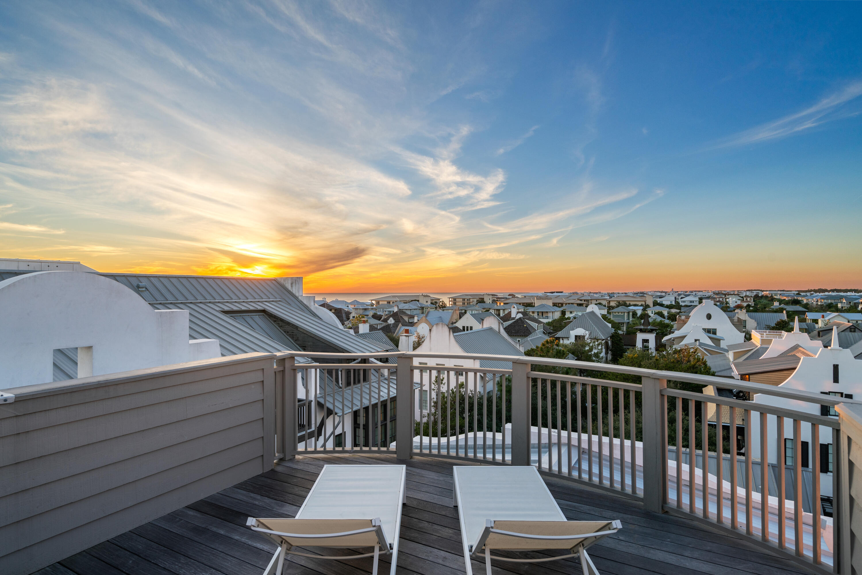16 South Barrett Square, Unit 5 Rosemary Beach, FL 32461 - Photo 83 of 100 a view of a chairs and table on the terrace