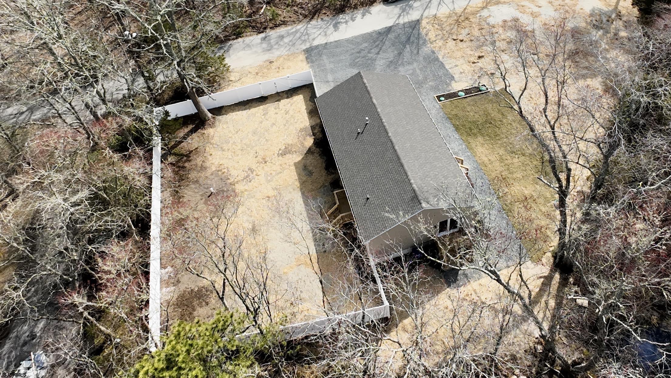 607 Sea Ranch Avenue Mays Landing, NJ 08330 - Photo 20 of 23 an aerial view of residential house with pool and wooden fence