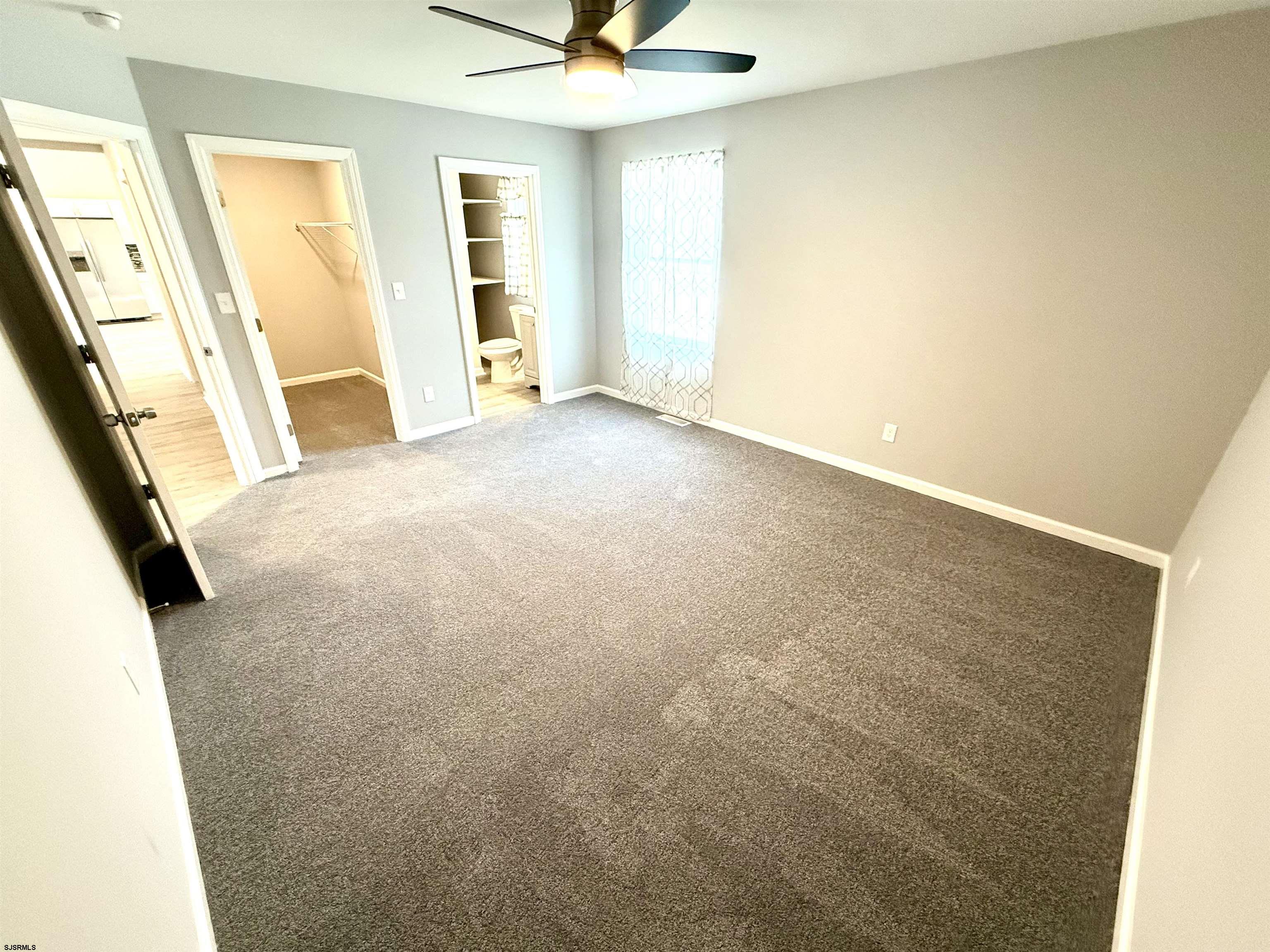 607 Sea Ranch Avenue Mays Landing, NJ 08330 - Photo 7 of 23 a view of an empty room with window