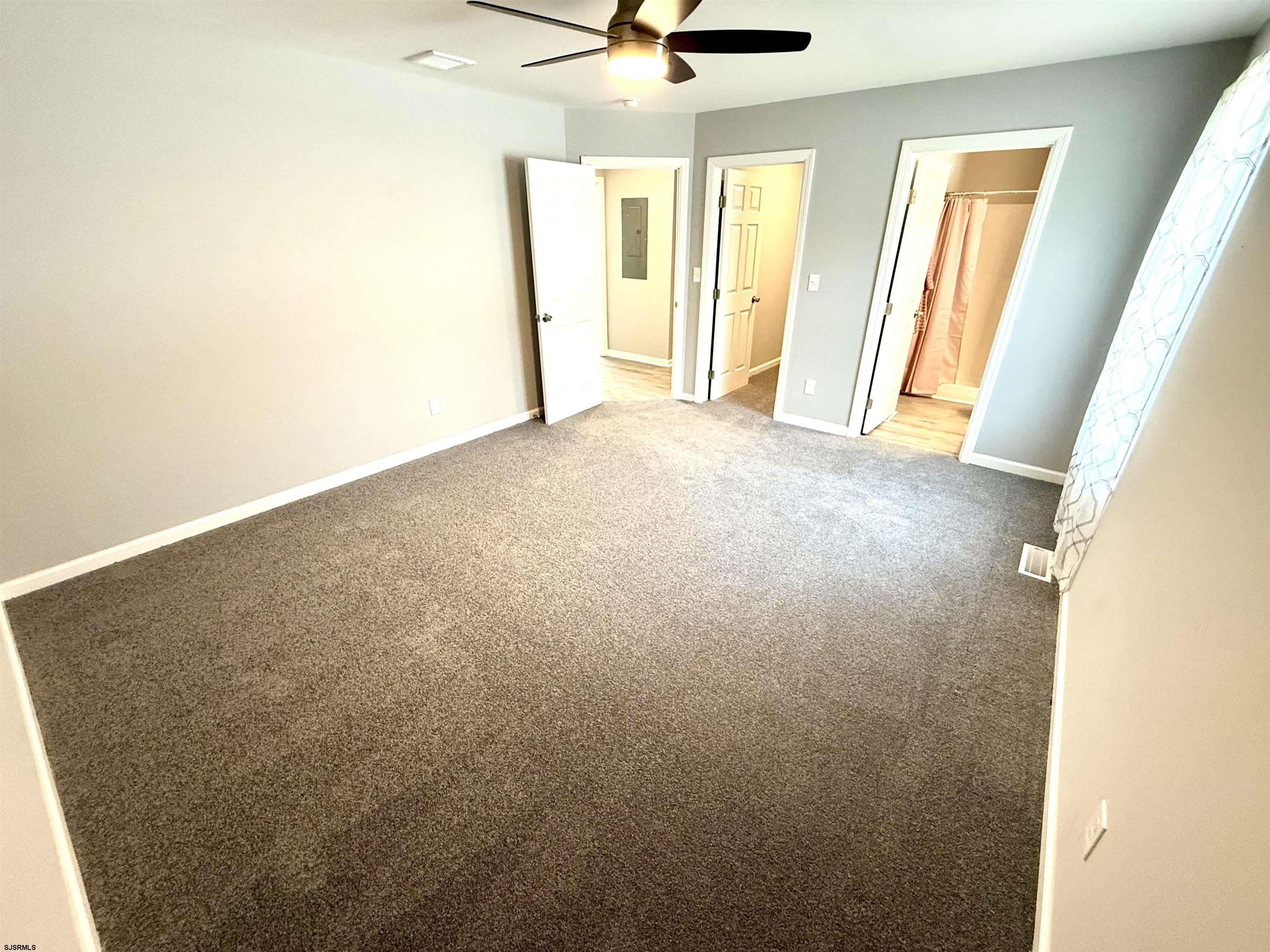 607 Sea Ranch Avenue Mays Landing, NJ 08330 - Photo 8 of 23 a view of an empty room with a window
