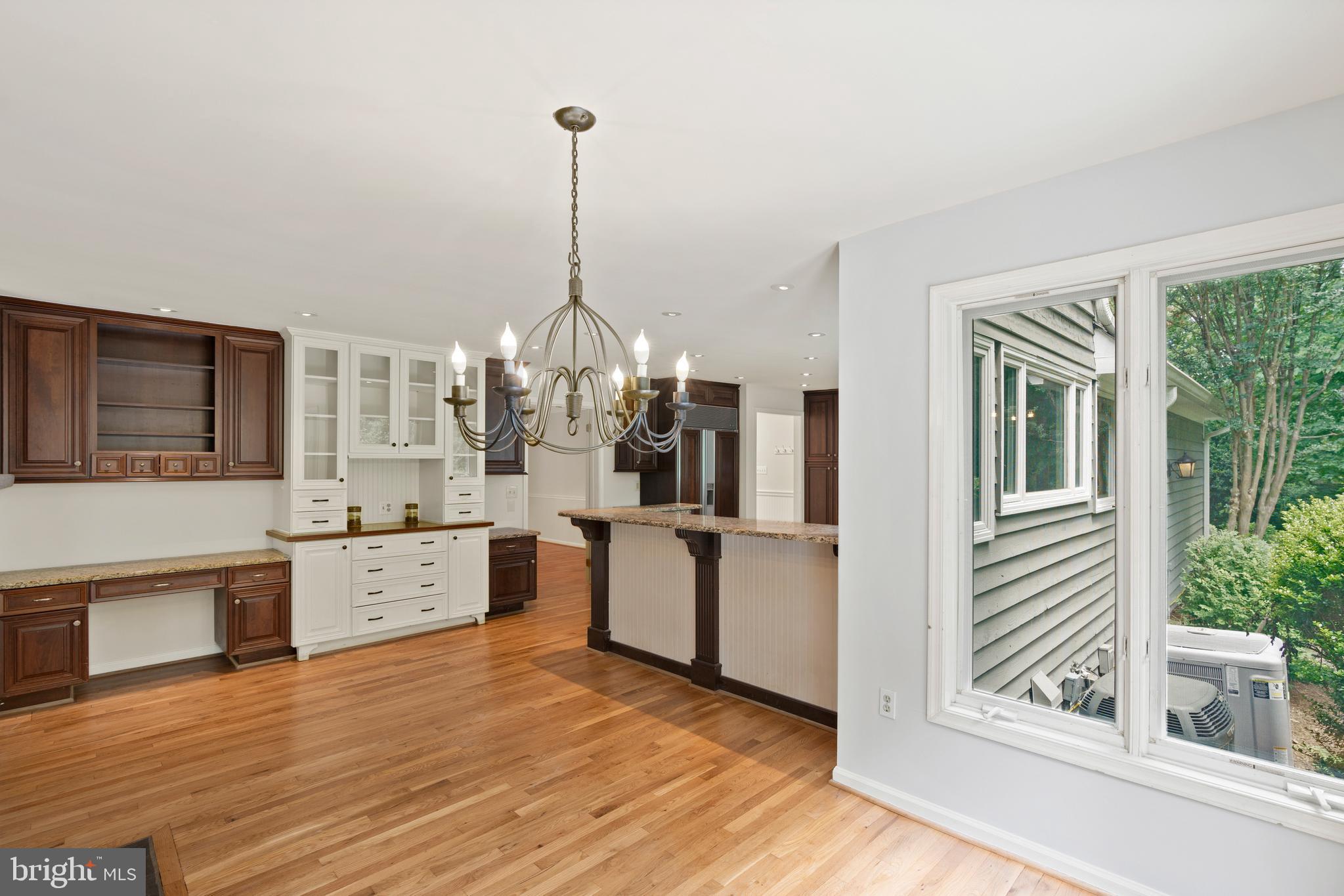 713 Clear Spring Road Great Falls, VA 22066 - Photo 11 of 41 Great breakfast nook w traditional and bar seating