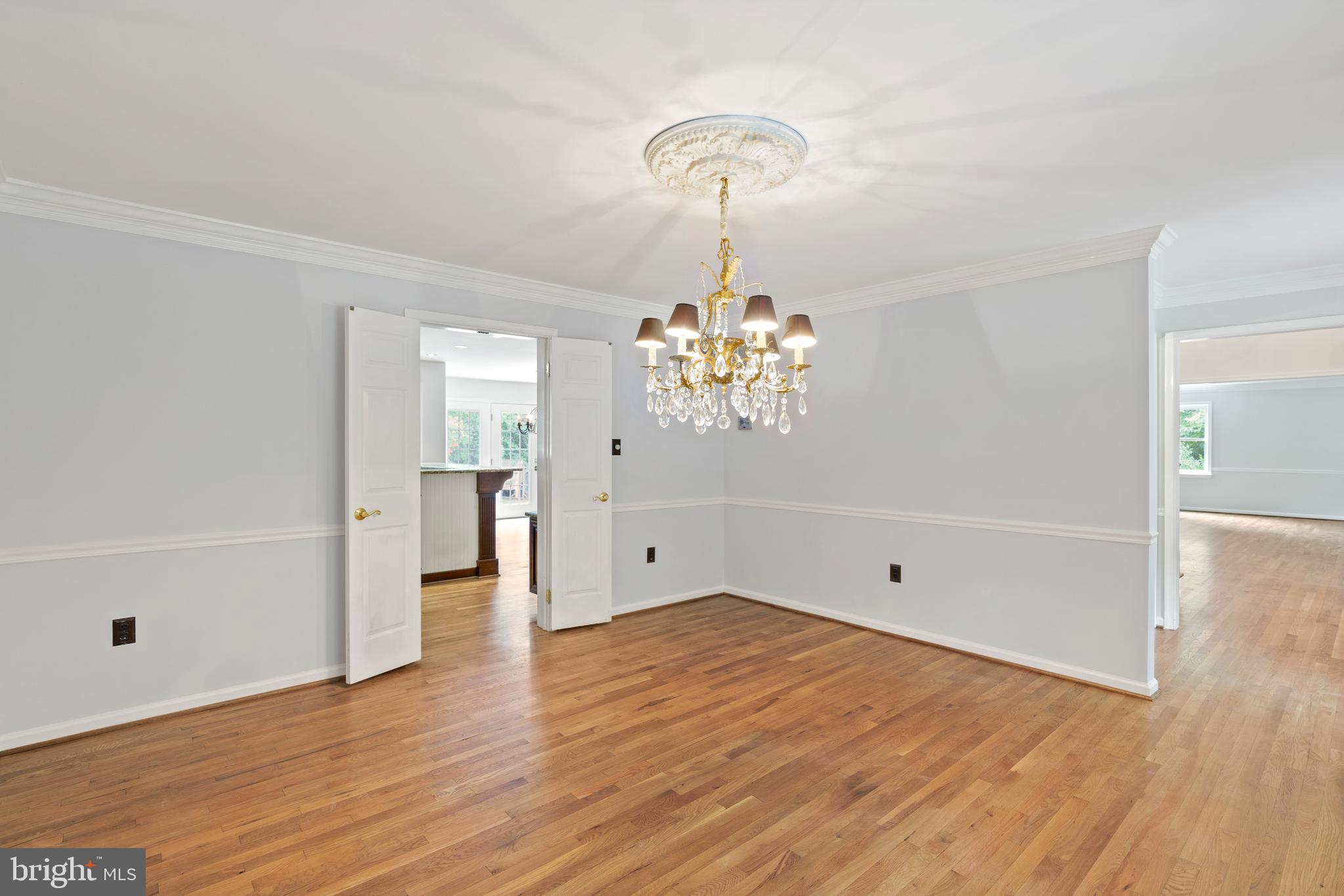 713 Clear Spring Road Great Falls, VA 22066 - Photo 18 of 41 The dining room opens to the foyer.
