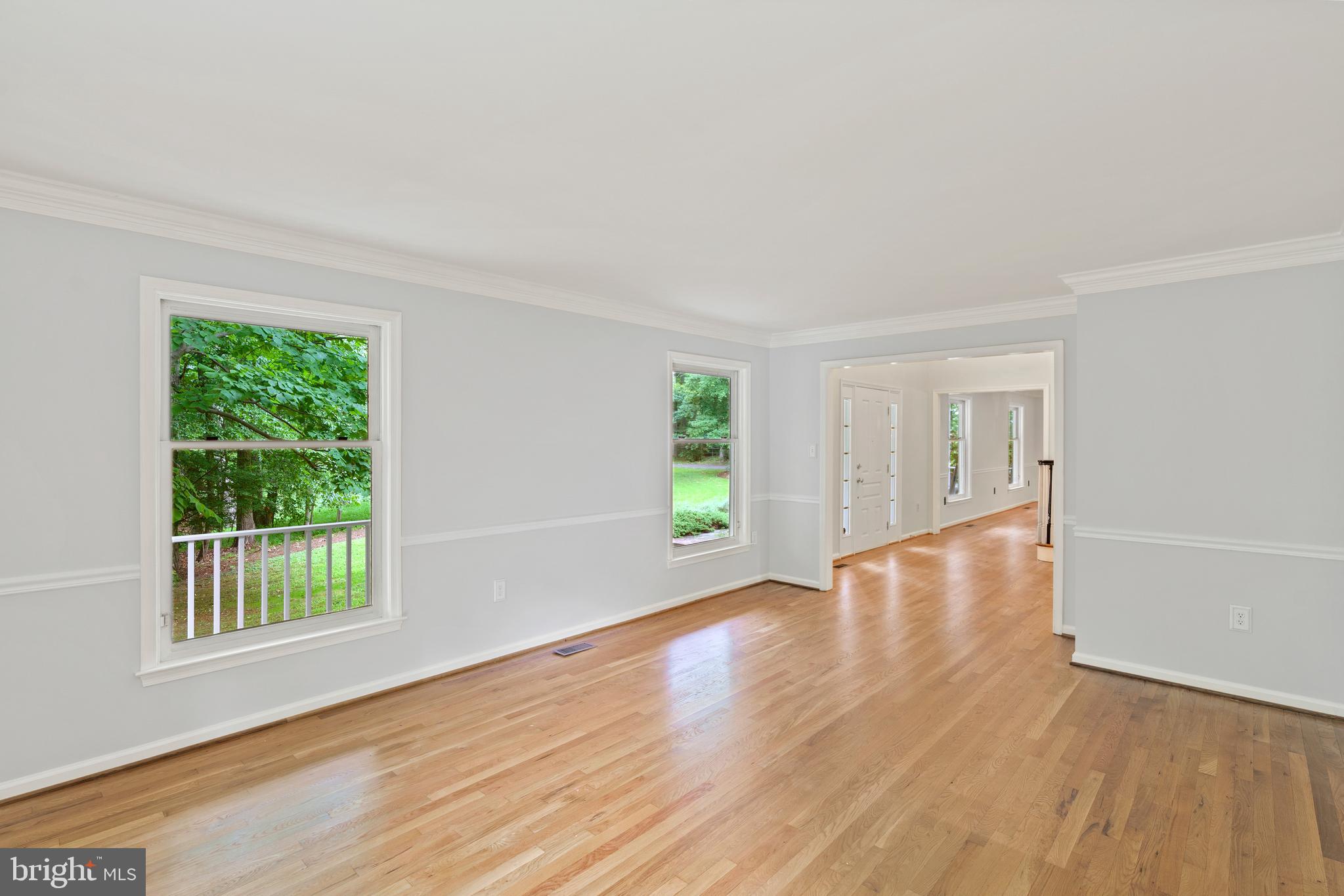 713 Clear Spring Road Great Falls, VA 22066 - Photo 19 of 41 Living room off of the front foyer.