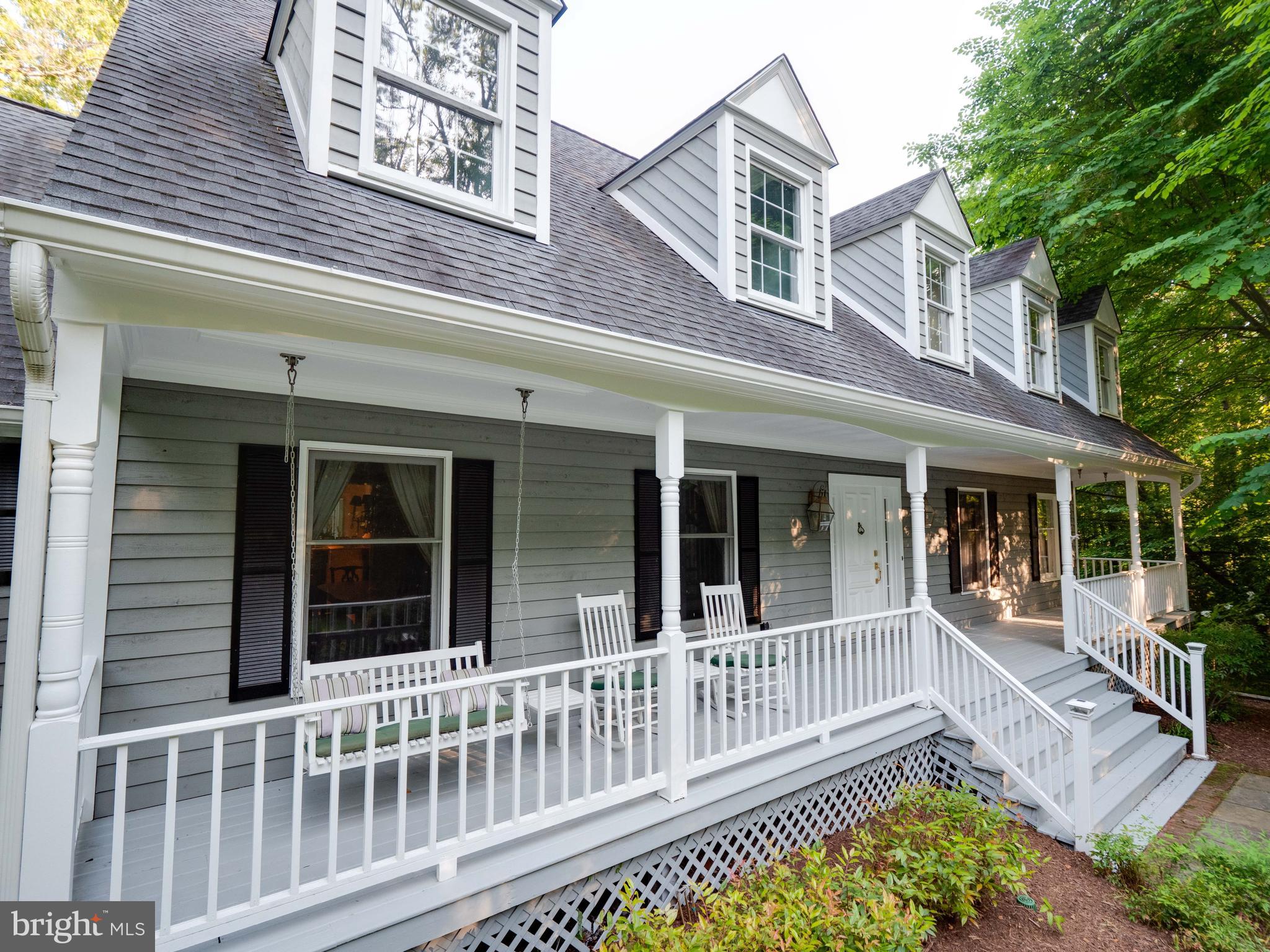 713 Clear Spring Road Great Falls, VA 22066 - Photo 3 of 41 Swing on the porch with an old-fashioned lemonade.
