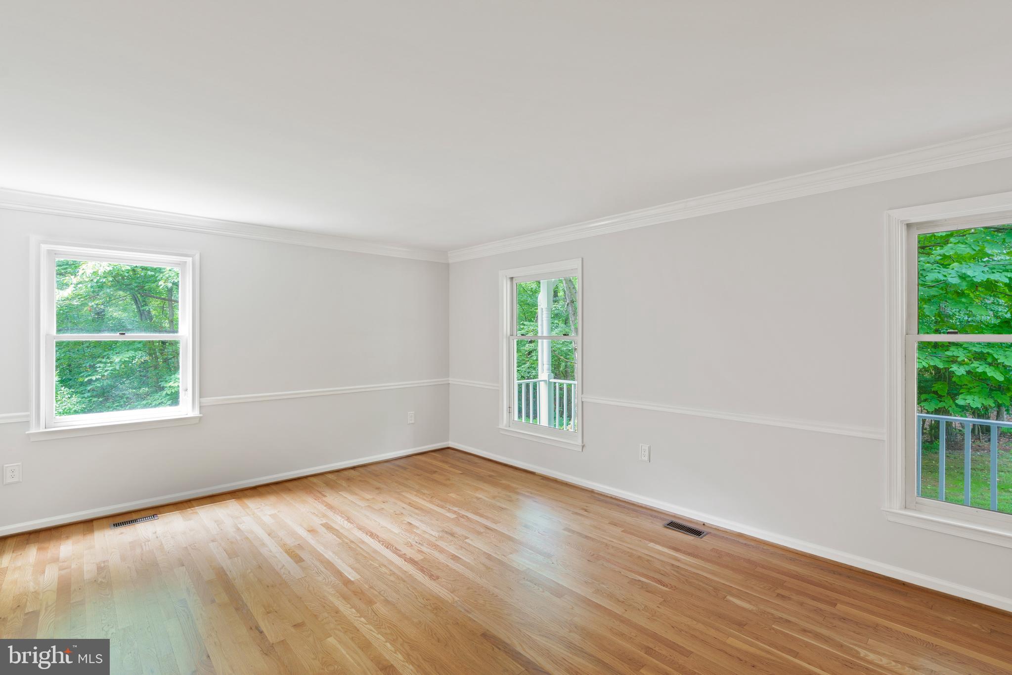713 Clear Spring Road Great Falls, VA 22066 - Photo 21 of 41 Large living room at the front of the house.