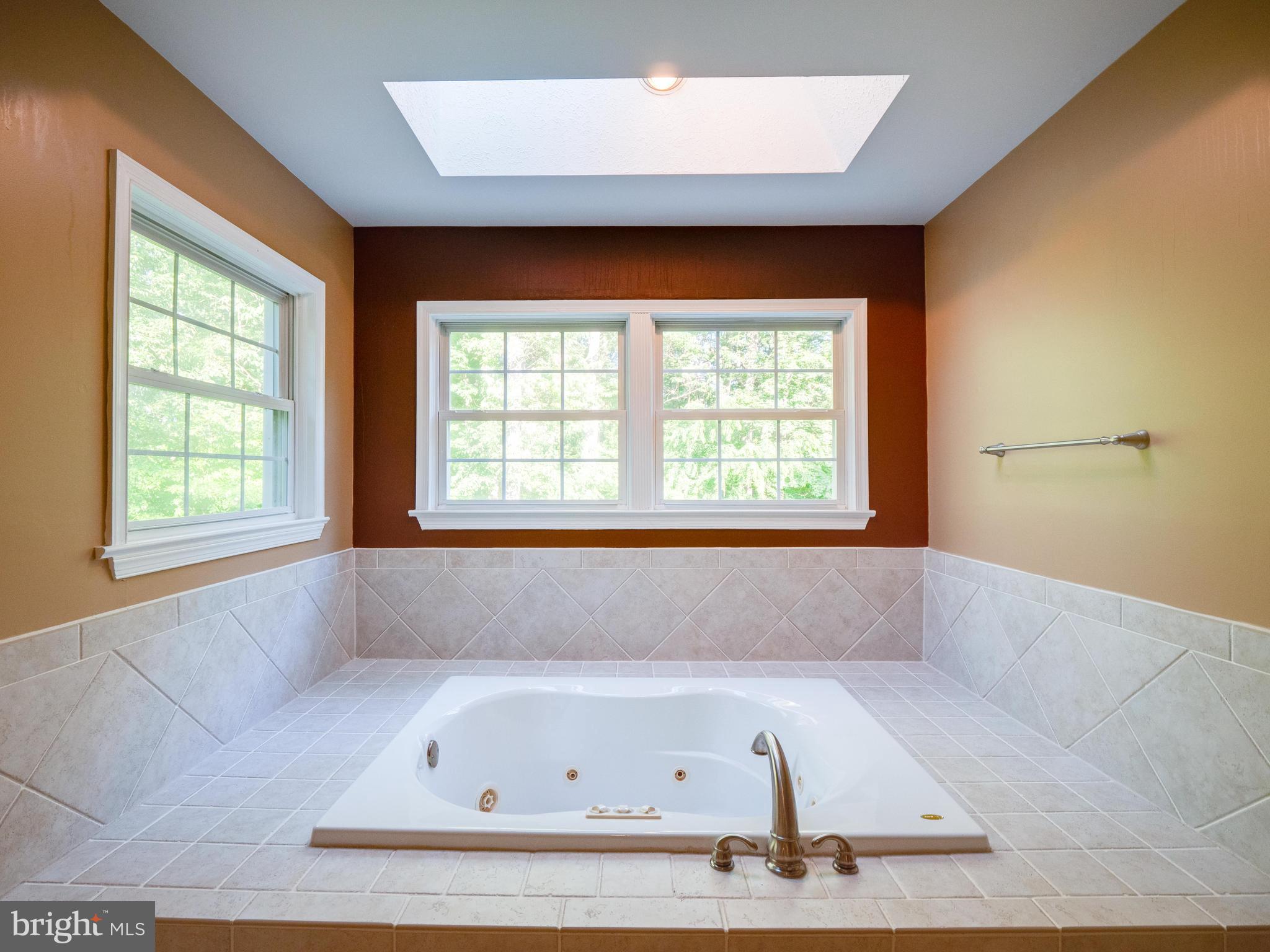 713 Clear Spring Road Great Falls, VA 22066 - Photo 27 of 41 Soaking tub in primary bathroom.