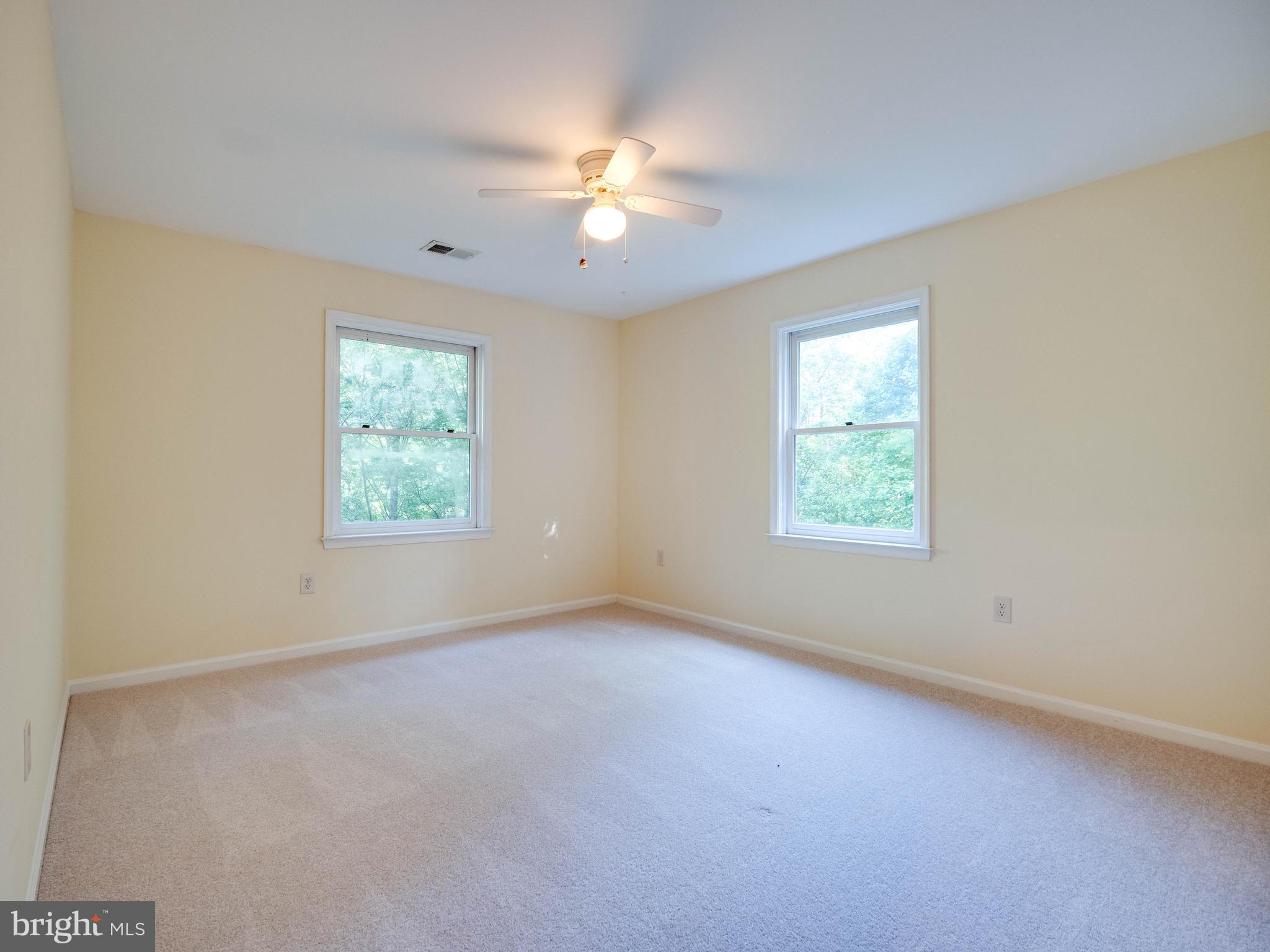 713 Clear Spring Road Great Falls, VA 22066 - Photo 31 of 41 Third bedroom with views on both sides.