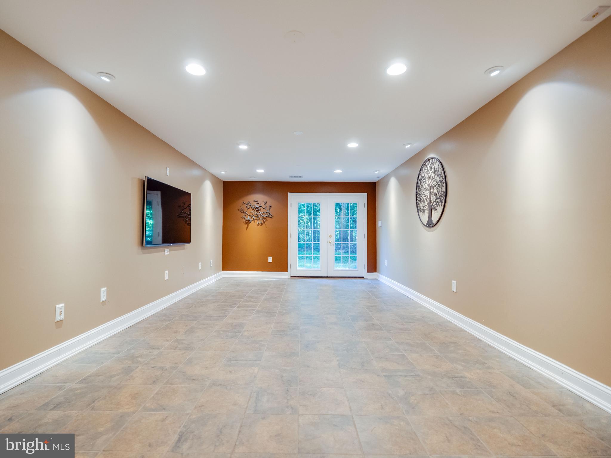 713 Clear Spring Road Great Falls, VA 22066 - Photo 34 of 41 Lower level space for games, exercise, you name it