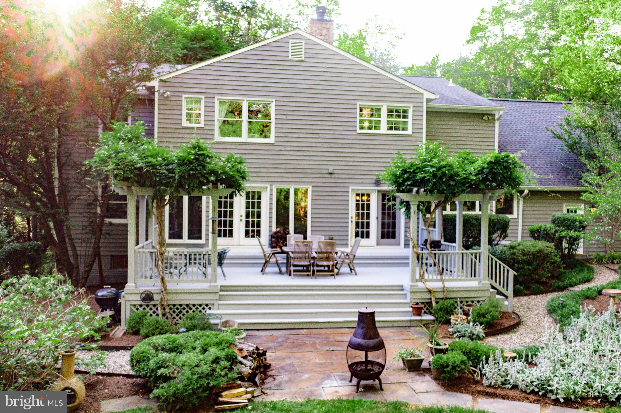 713 Clear Spring Road Great Falls, VA 22066 - Photo 5 of 41 Fantastic deck surrounded by wisteria.