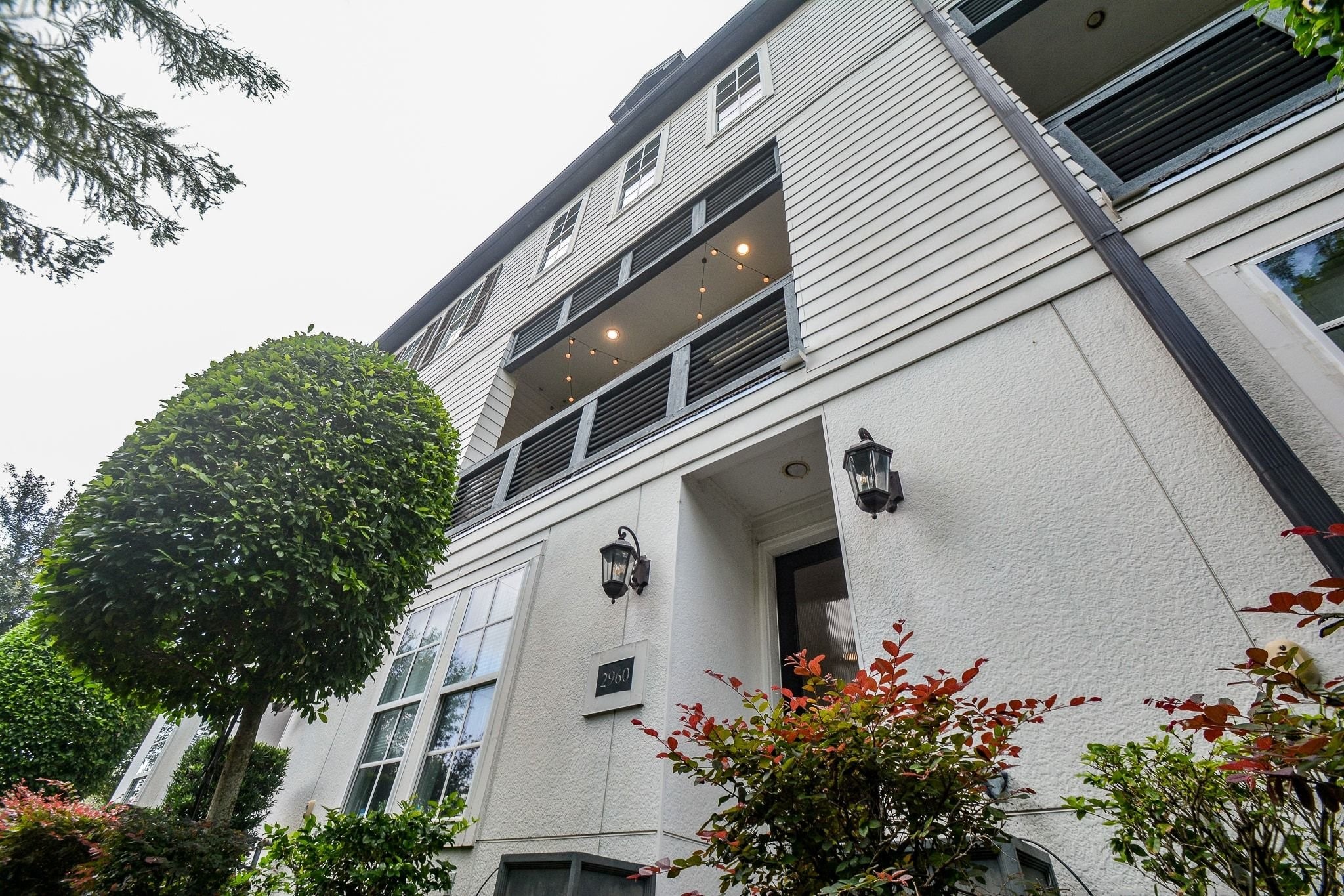 2960 Rusk Street Houston, TX 77003 - Photo 2 of 25 Front door, front property, looking up at all 3 levels, including the balcony area.