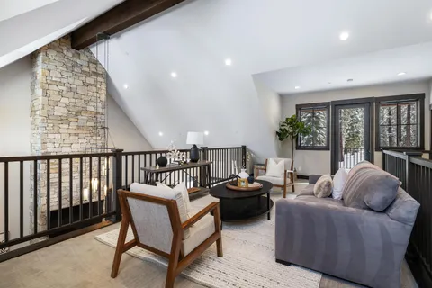 a living room with furniture and window
