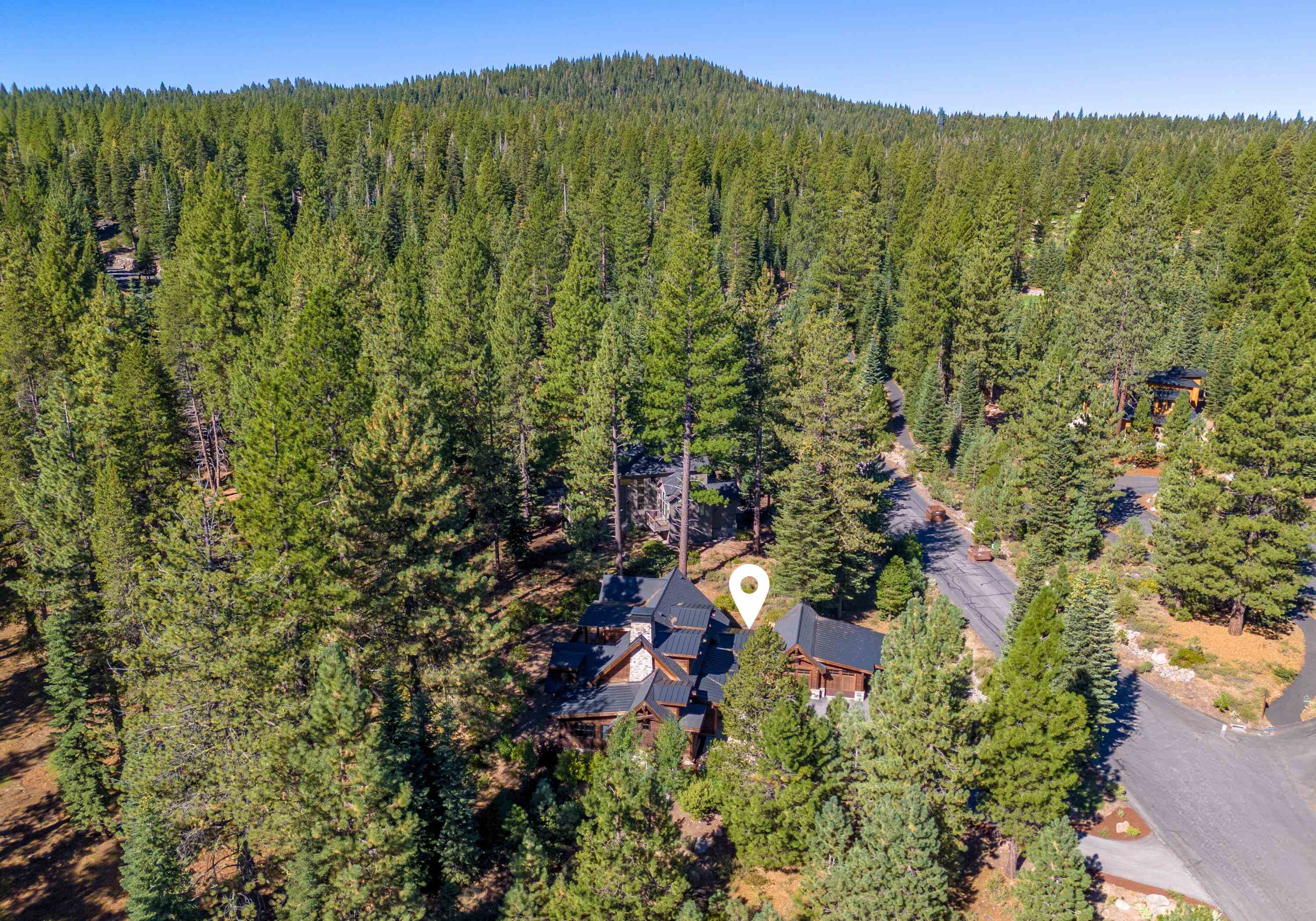 10601 Carson Range Road Truckee, CA 96161 - Photo 6 of 25 a view of a city with lush green forest